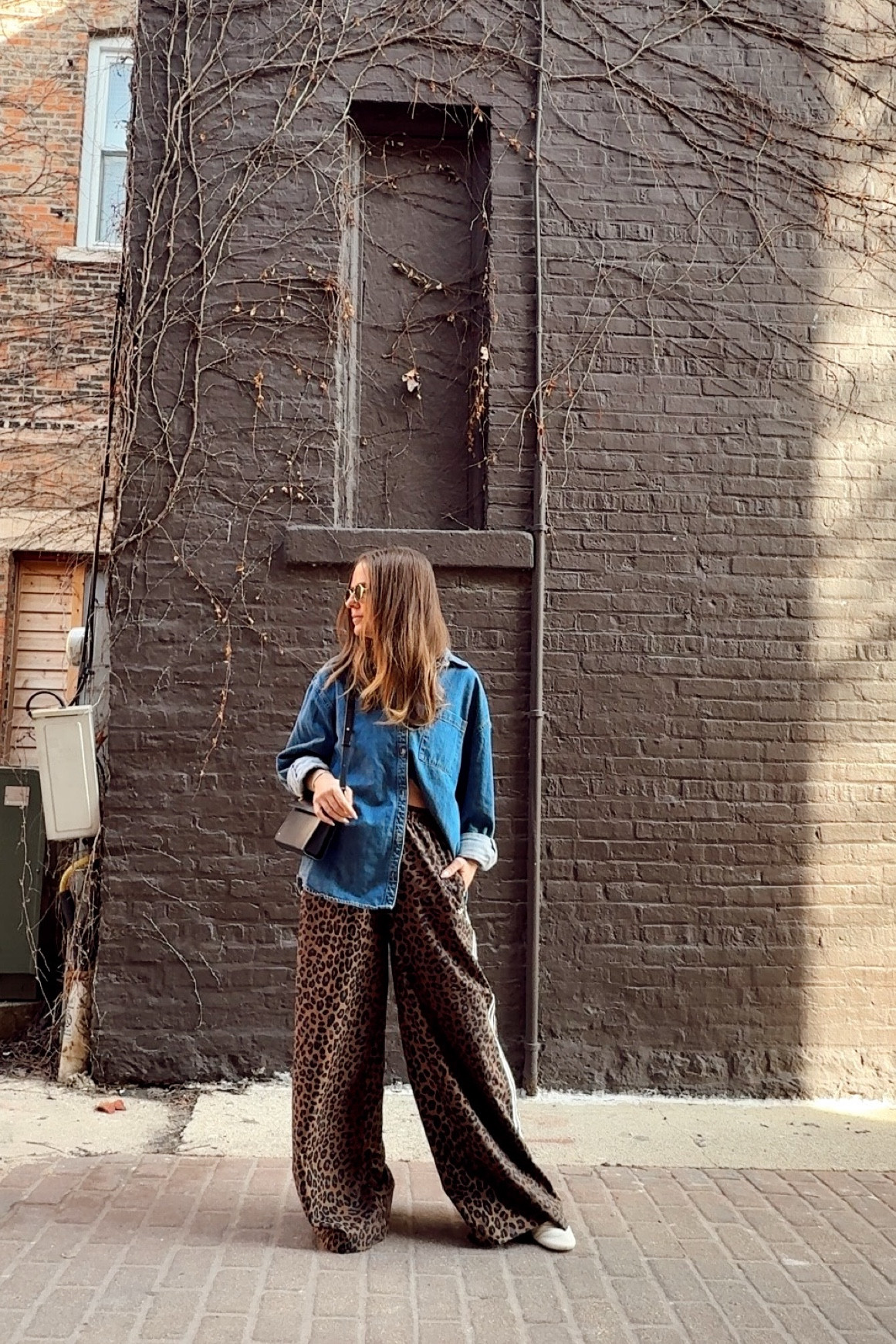 Oversized leopard Adidas track pants. Run a little large. Wearing extra small.  Oversized denim button up from Old Navy.  It is oversized and I sized up to a medium. Sunglasses are Amazon and Adidas shoes run TTS.  

#LTKOver40 #LTKootd #LTKdayinmylife