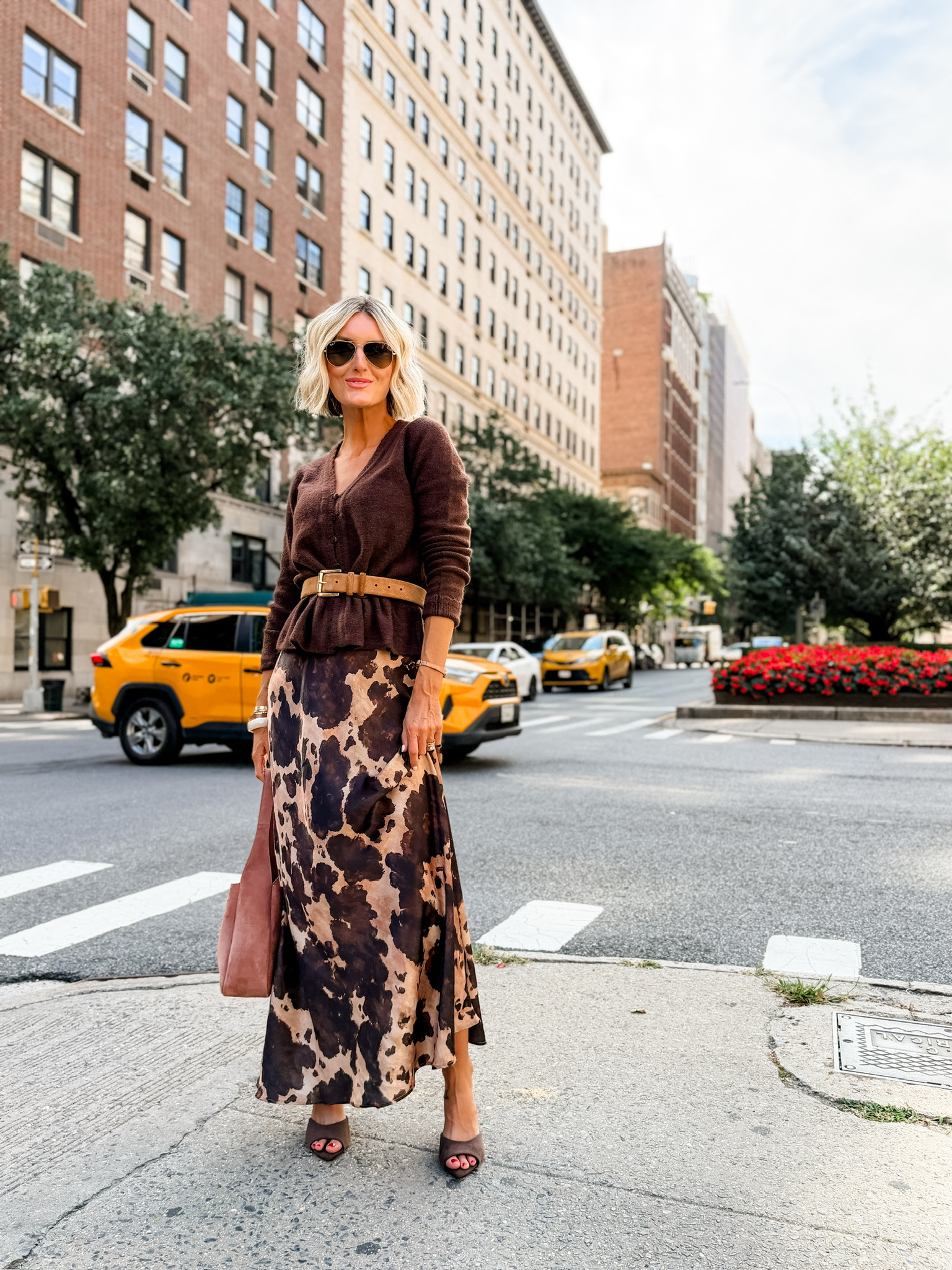 How fun is the animal print on this skirt?! I’ll be reaching for this combo all season. Wearing an XS in the cardigan & 2 in the skirt! 

Loverly Grey, fall outfit idea, cow print skirt, animal print skirt, brown long sleeve cardigan sweater outfit 

 #LTKootd #LTKSeasonal #LTKWorkwear