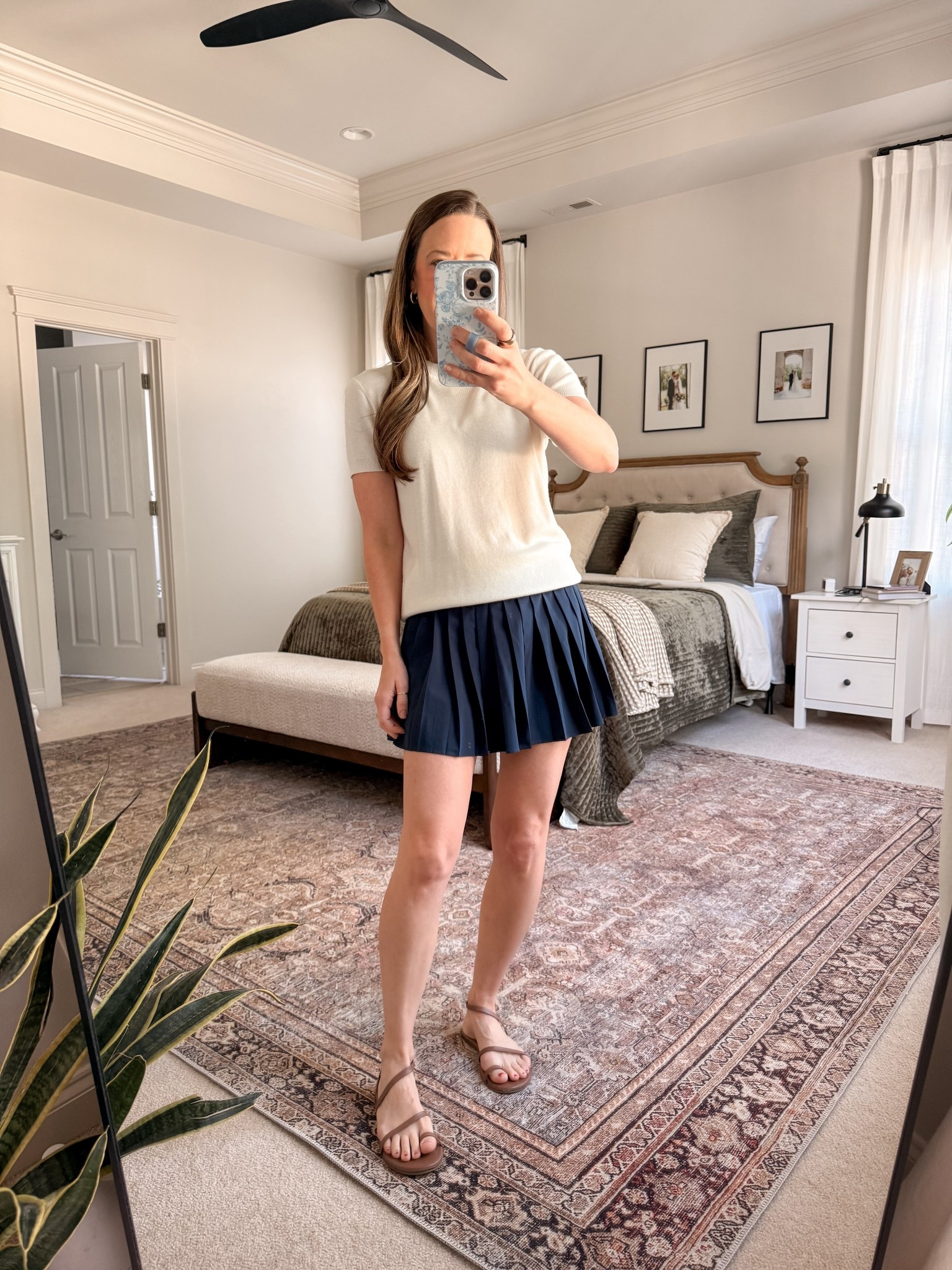 Navy pleated skirt outfit for spring and summer

Neutral fitted tee + navy tennis style skirt + brown flat sandals.

This is an easy casual mom outfit for warm weather, travel days, or weekend errands. The pleated mini skirt gives a sporty look while the neutral top keeps it classic and versatile.

Perfect for:
• Pleated mini skirt outfit
• Tennis skirt outfit casual
• Spring mom outfit
• Summer everyday outfit
• Neutral capsule wardrobe

#LTKmomlife #LTKgrwm #LTKootd