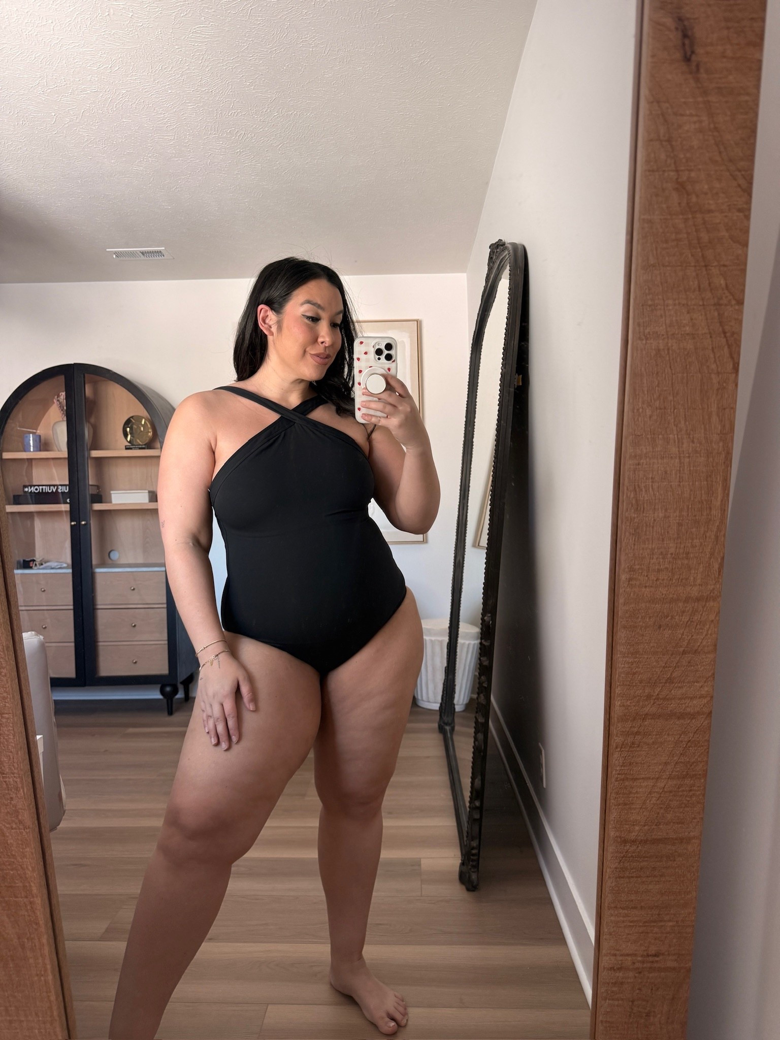Your one piece doesn’t have to be boring! The neckline on this swimsuit is so chic and flattering 🖤👏🏻 Spanx haul | Midsize curvy swim finds for spring, summer, & your next vacation! 
-
-
-
Spanx, Midsize, Swim, Swim skirt,  Swimsuits, Midsize swimsuit, Bikini, One Piece, Summer, Vacation, Spring Break, Travel, @Spanx 

#LTKTravel #LTKMidsize #LTKSwim