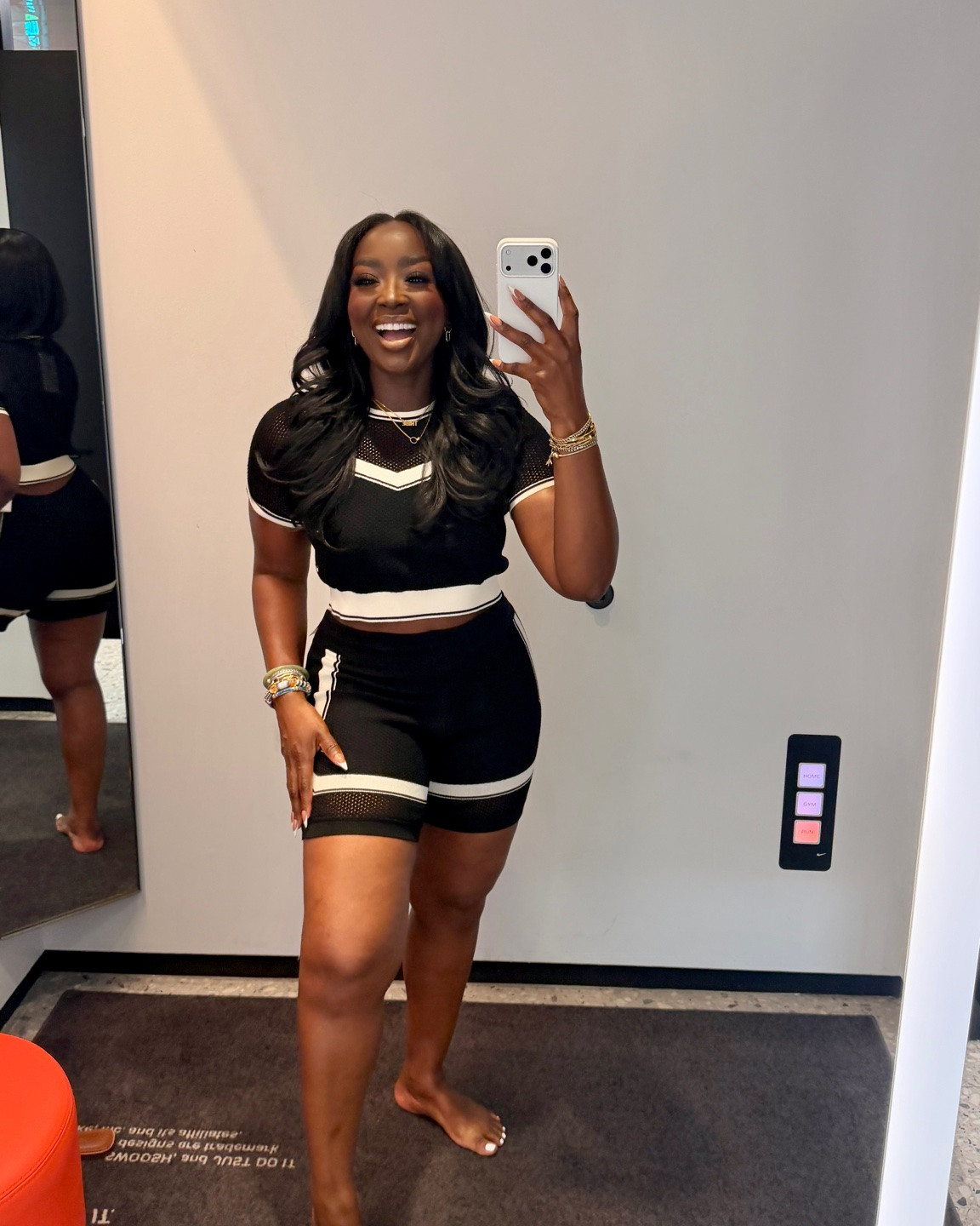 This set from Nike is so cute! Wearing a large on top, make sure you get a large on bottom if you are shaped like me. I grabbed a small, accidentally.