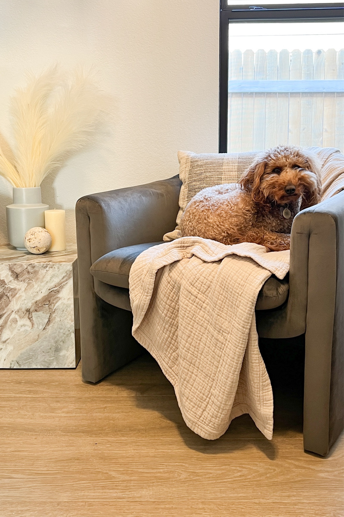 Marble End Table and super cozy velvet side chairs with a modern shape.