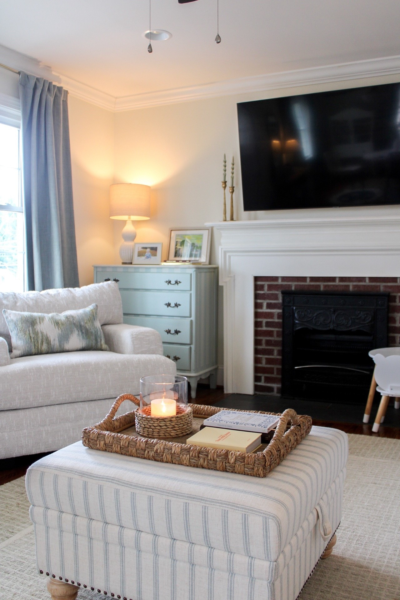Loving this new ottoman in our living room - the striped fabric gives this space a pop of color and it also has storage! So functional! 🤍

#LTKdayinmylife #LTKHome #LTKmomlife