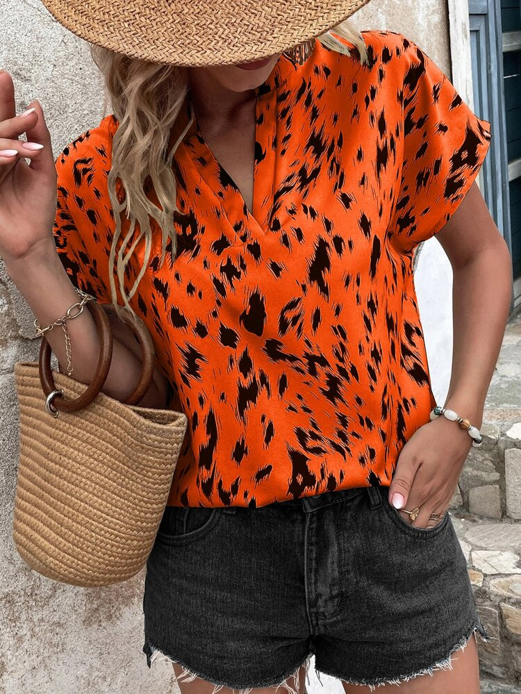 Allover Print Notched Neck Batwing Sleeve Blouse | SHEIN