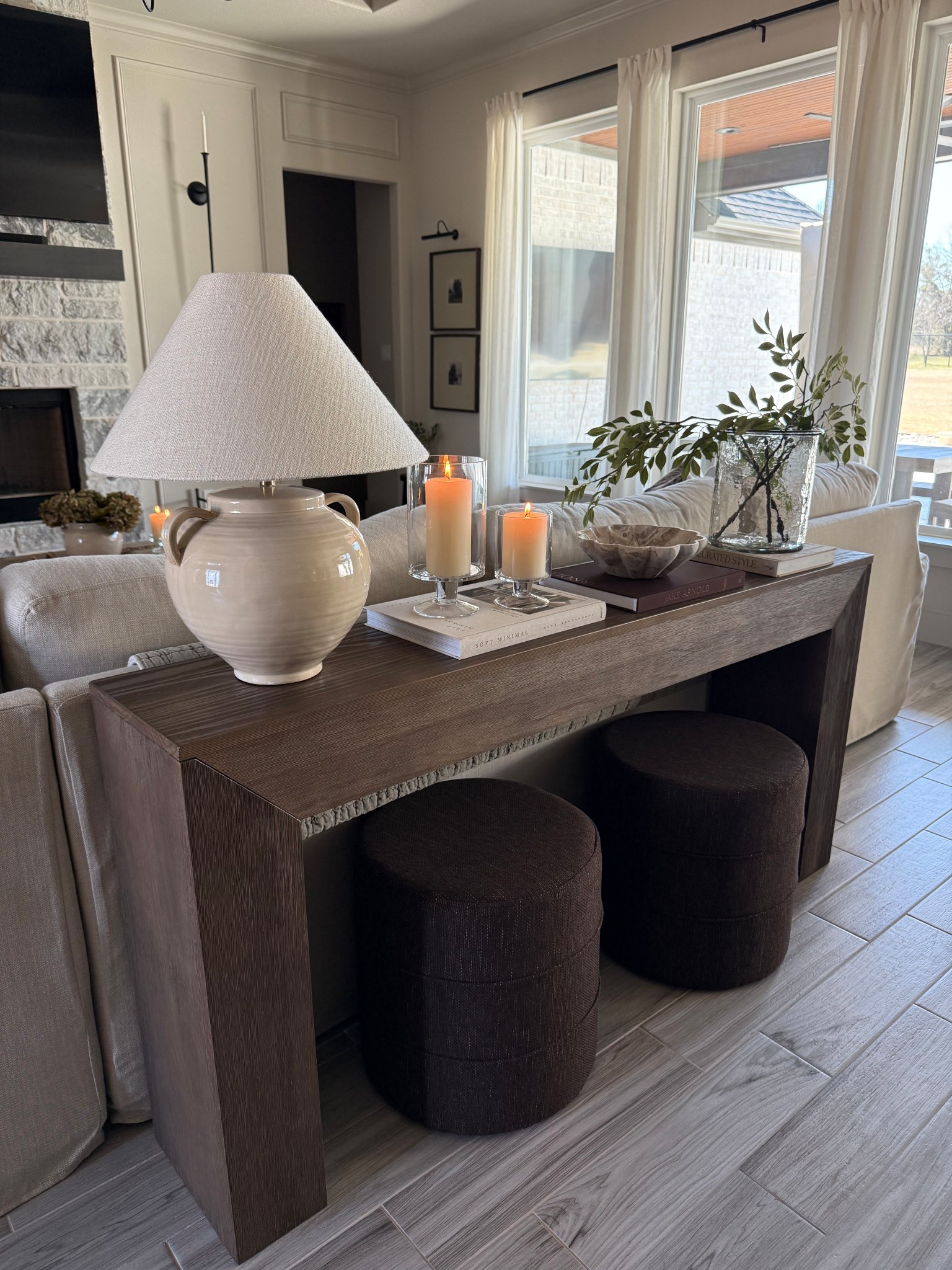Console Table Styling ✨

The glass candle holders are from AtHome. 

Marble scalloped bowl is from HomeGoods 

The Glass Hurricane is old from Target
