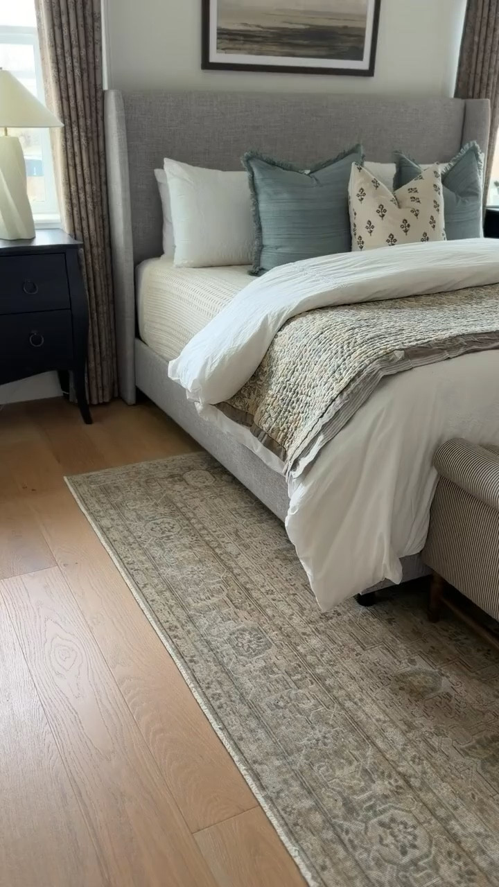 This area rug is one of my absolute favorites! The warm earthy tones throughout are absolutely beautiful, and pull this entire space together. For rule of thumb, I always leave the top of the rug about a foot out from our nightstands, allowing an equal amount on either side of the bed, and allowing space at the end as well. Never start your rug at the top of the headboard! 

#LTKHome