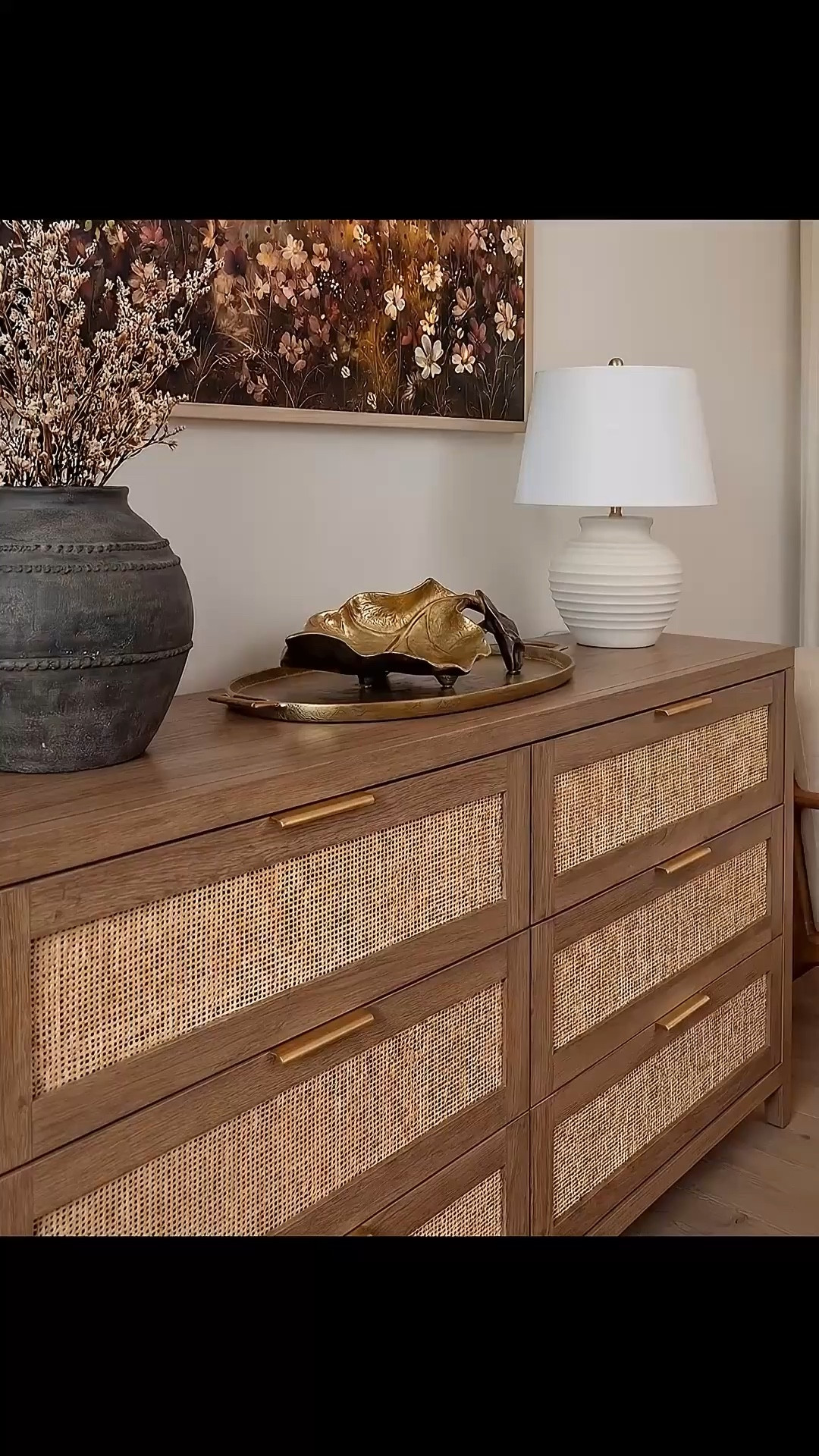 Shop the Look:
• Woven rattan bed frame
• White upholstered mattress or box spring
• Black wood 3-drawer nightstands (set of 2)
• White duvet cover (hotel-style)
• White fitted sheet + pillow set
• Chunky knit throw blanket (beige or oatmeal)
• Neutral patterned accent pillow
• Brass globe wall sconces
• Cream ceramic table lamp with beige shade
• Large abstract landscape wall art (neutral tones)
•brown floral wall art
• Gold irregular curved scalloped wall mirrors
• Round woven knit poufs
• Neutral geometric or diamond area rug
• Large white ceramic vase
• Small decorative bowl (white or stone)
• Ivory linen curtain panels
•wood upholstered accent chair 
•black terracotta vase
•wood rattan dresser
•brass decor tray
•black leaf decor bowl 
•decor books



#LTKHome #LTKSaleAlert