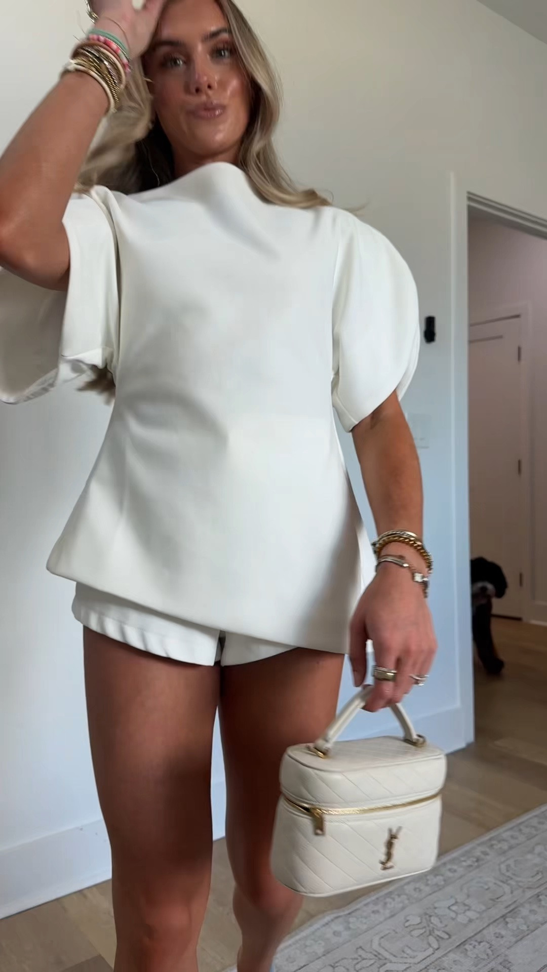 My outfit to go wedding dress shopping. My top is Amazon size small Chevara Women’s Balloon Short Sleeve Top Trendy Boat Neck Asymmetric Hem Solid Color Slim Fit Blouse Tops. My shorts are size XXS the white micro shorts from @Revolve   my amazon blue kitten heels and my YSL vanity bag

#LTKootd #LTKWedding #LTKdayinmylife