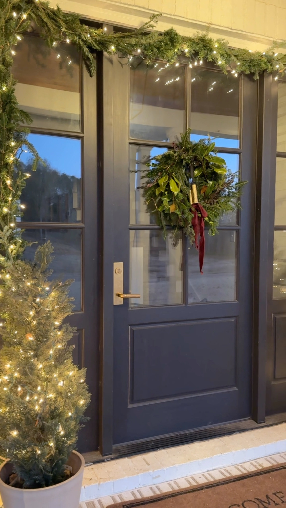 This year I tried my hand at DIYing some real garland around our front door using clippings I picked up from our local Christmas tree farm’s discard pile — and it worked so well! If DIY isn’t your thing, I’ll link the live garland I bought from Lowe’s and used last year, along with the rest of our front porch decor. The wreath is also a simple DIY and was such a fun way to bring in that classic, natural look. 🤍🌲

#LTKHome #LTKHoliday #LTKSeasonal