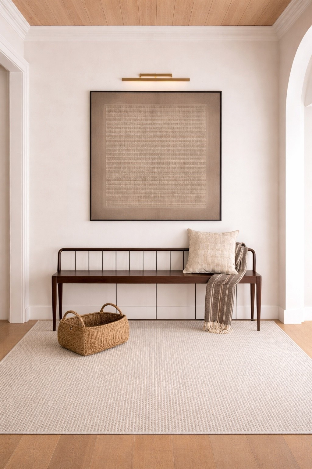 I love this hallway styling moment! This bench is gorgeous and would be perfect in a hallway as shown here, in an entryway, or even at the end of a bed. Warm, modern, and organic! 

#LTKHome