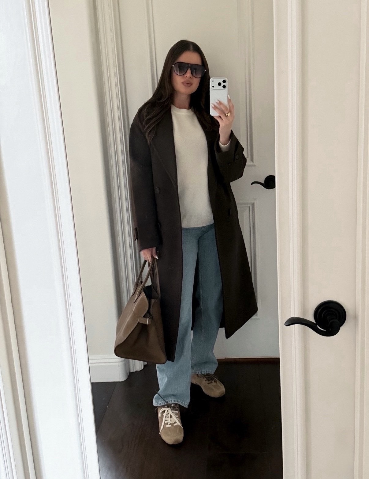 Styling this espresso brown coat with straight leg jeans, cashmere sweater and suede sneakers 
#espresso #brown #darkbrown #chocolatebrown #coat #cashmere #sweater #beige #cream #therow #zara #margaux #suede #sneakers #miumiu #aviators #newbalance 
#wintercoat 

#LTKgrwm #LTKWorkwear #LTKootd