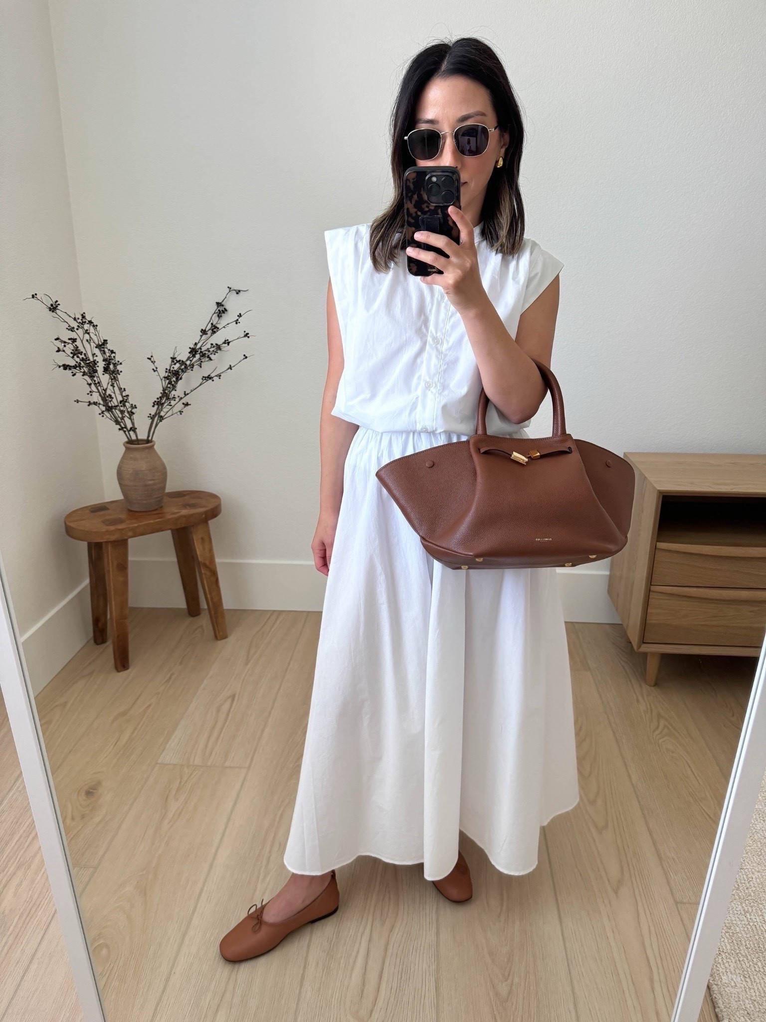 Simple spring outfit ideas. How to style a white poplin skirt. 

Banana Republic factory top xs (old, linked similar)
Madewell midi skirt xs (old, linked similar)
Everlane flats 5
DeMellier bag 
Le Specs sunglasses
J.Crew earrings

Spring outfits 2026, spring style, summer outfits, white skirt, spring skirts, petite style

#LTKootd #LTKmomlife #LTKPetite