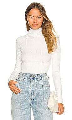 Enza Costa Viscose Rib Twist Back Long Sleeve Turtleneck in Unbleached from Revolve.com | Revolve Clothing (Global)