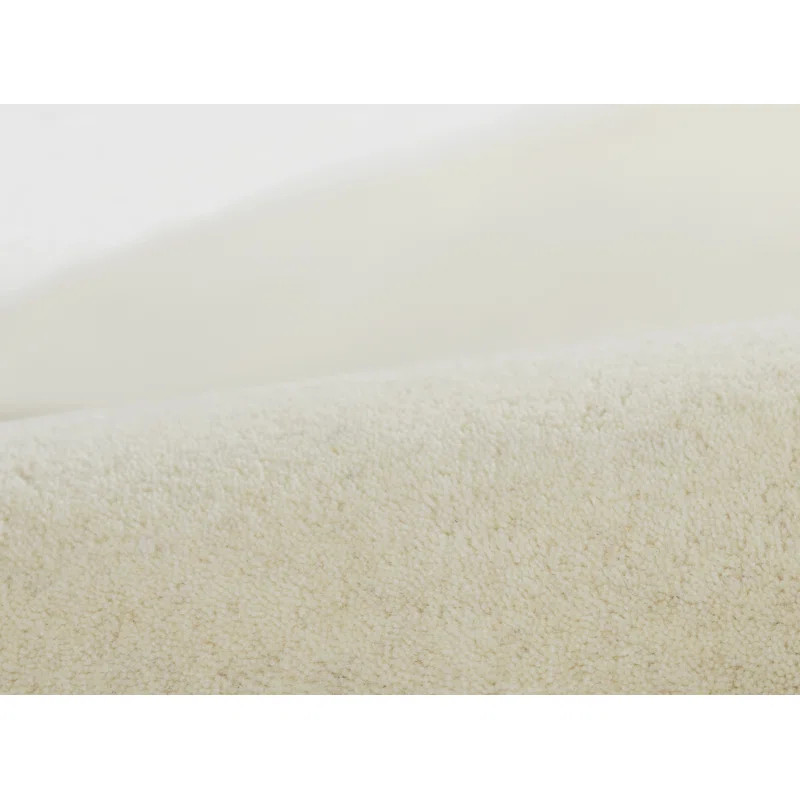 Dabria Hand Tufted Wool Solid Color Rug | Wayfair North America