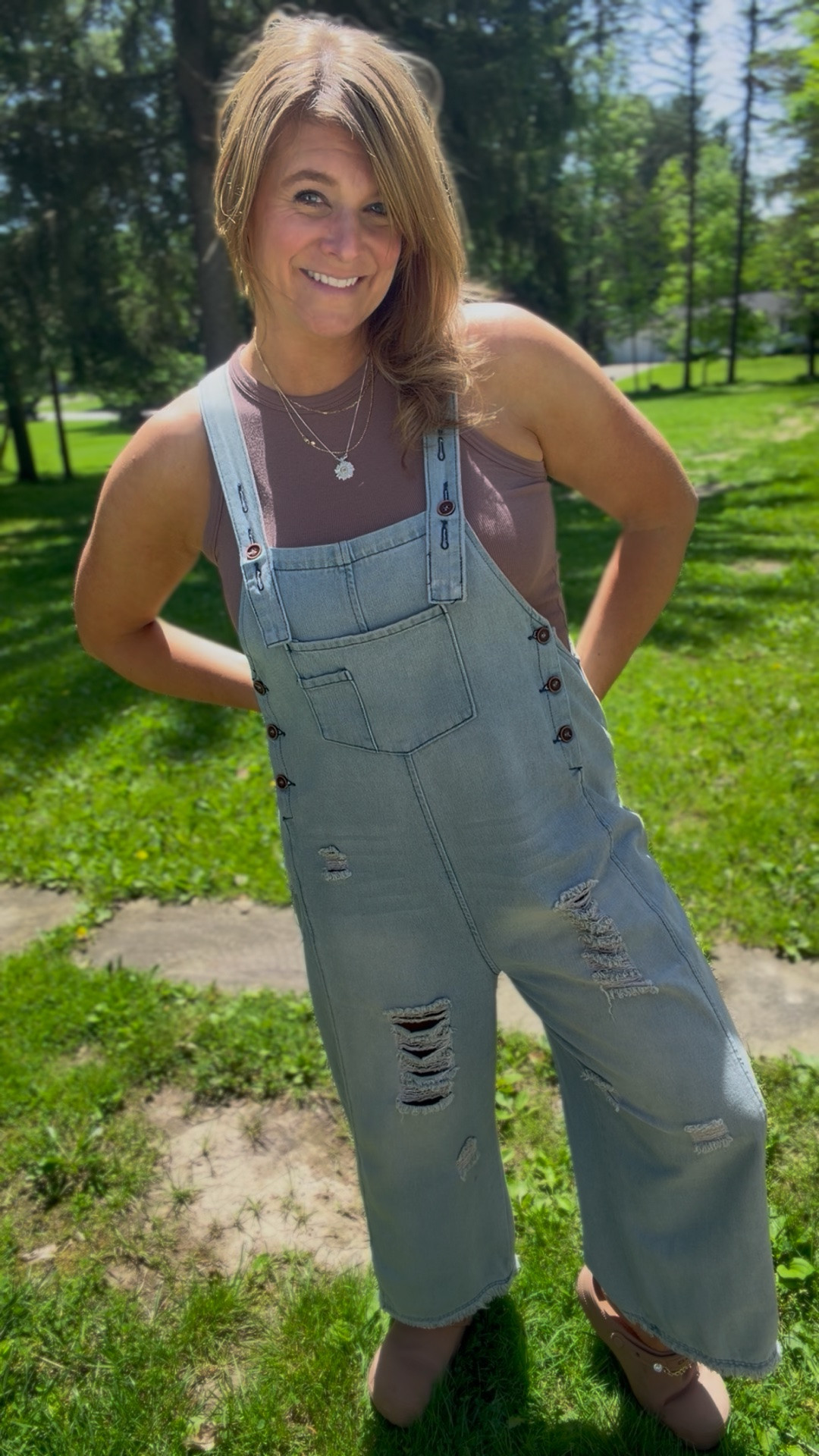 These overalls are the definition of cute + comfortable 🤍✨ The relaxed fit, distressed details, and wide-leg silhouette make them an easy throw-on-and-go piece you’ll reach for all summer long. Pair them with a tank, tee, or swimsuit for the perfect effortless outfit! ☀️👖

#LTKStyle #OverallsOutfit #SummerStyle #CasualChic #MidsizeFashion #EverydayOutfit #AffordableFashion #OOTD #WardrobeStaple #LTKFinds

#LTKootd #LTKMidsize #LTKOver40