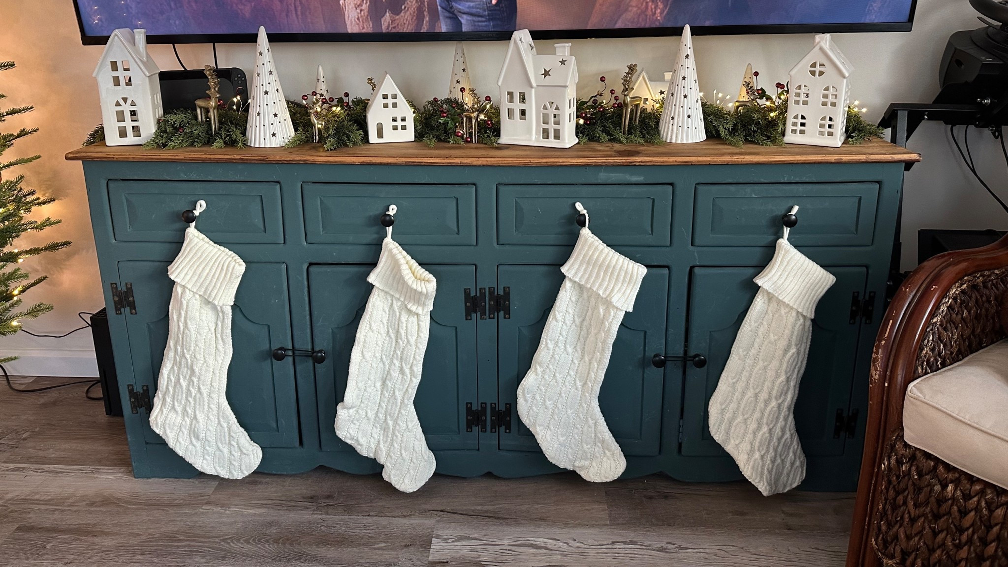 I just finished up my Christmas decor under my TV! I  always hang my stocking on the drawers. For my garland, I added little bells & berries for a pop of color and used my white ceramic house/tree set from Costco. Then I found little mini gold reindeer at home goods. I love how it all came together. 


#LTKSeasonal #LTKHome #LTKHoliday