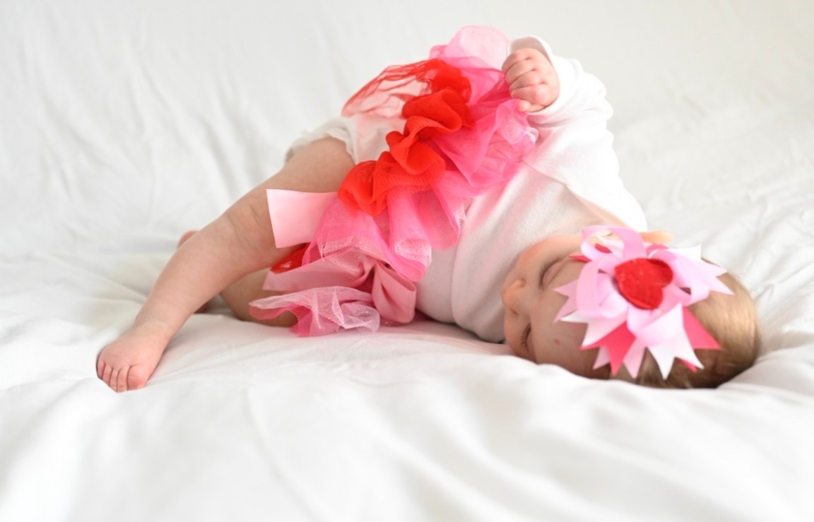Valentines photoshoot idea that I did with our daughter. I put a white sheet on our bed to have a plain background and then added a fun tutu and bow 

#LTKSeasonal #LTKKids #LTKBaby