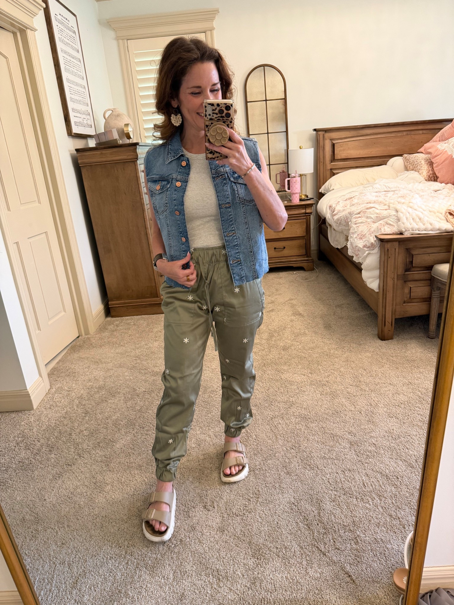 Embroidery Daisy joggers  🌼👖high line tank denim vest paired with my favorite pink platform Birkenstocks 

Wearing an extra small pants, extra small vest and small tank 

Save more with stackable code:LTK10

@Maurices   @HSN 

#LTKOver40 #LTKSaleAlert #LTKPetite