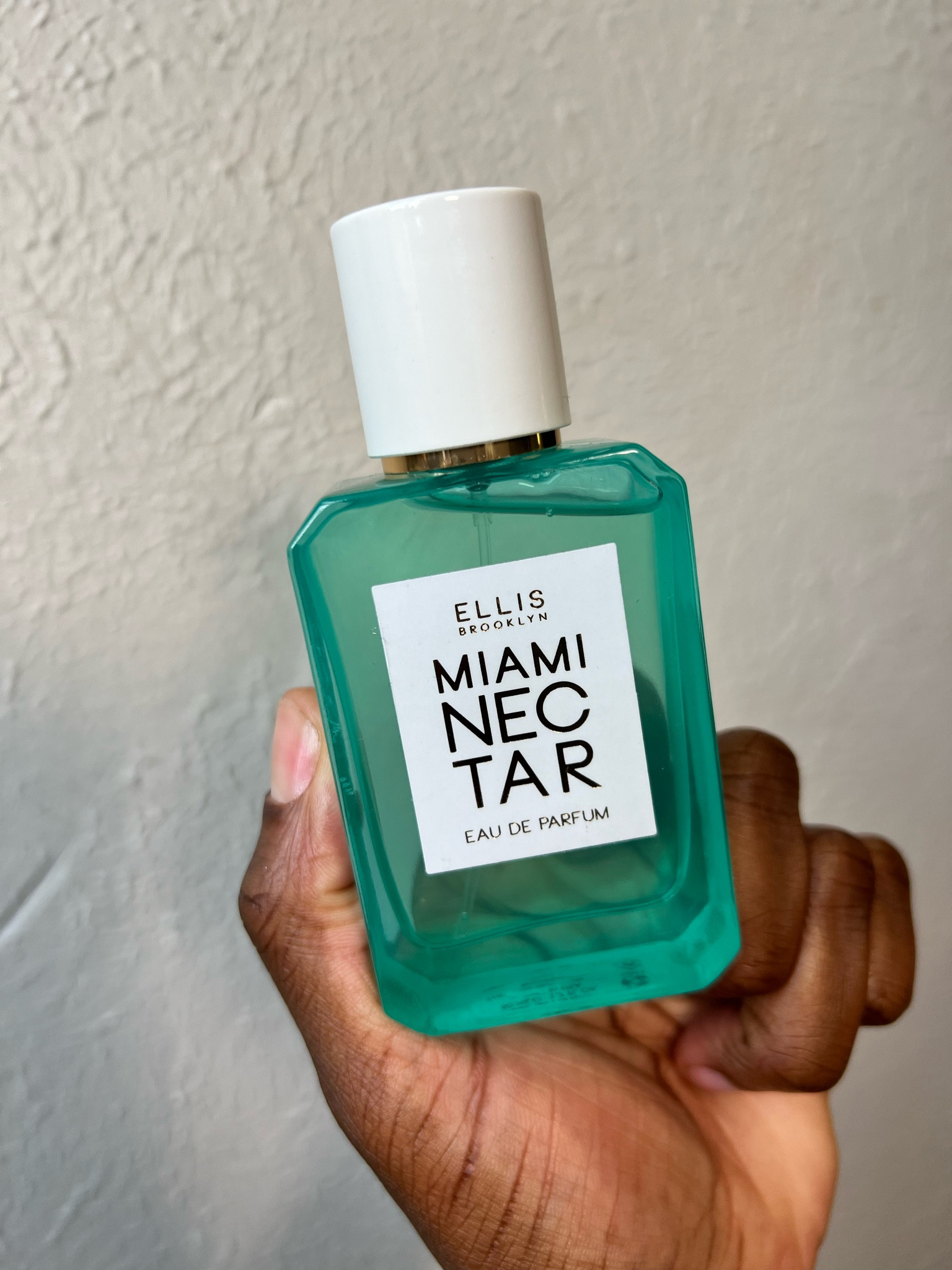 pink pineapple and coconut water, and backed by plumeria, vanilla, sweet amber, and salted woods.  My go to scent for spring! 