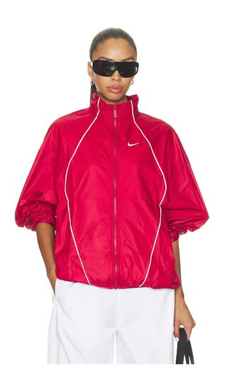 Nike Athletics Department Water Repellent Windbreaker in Red. - size M | Revolve Clothing (Global)