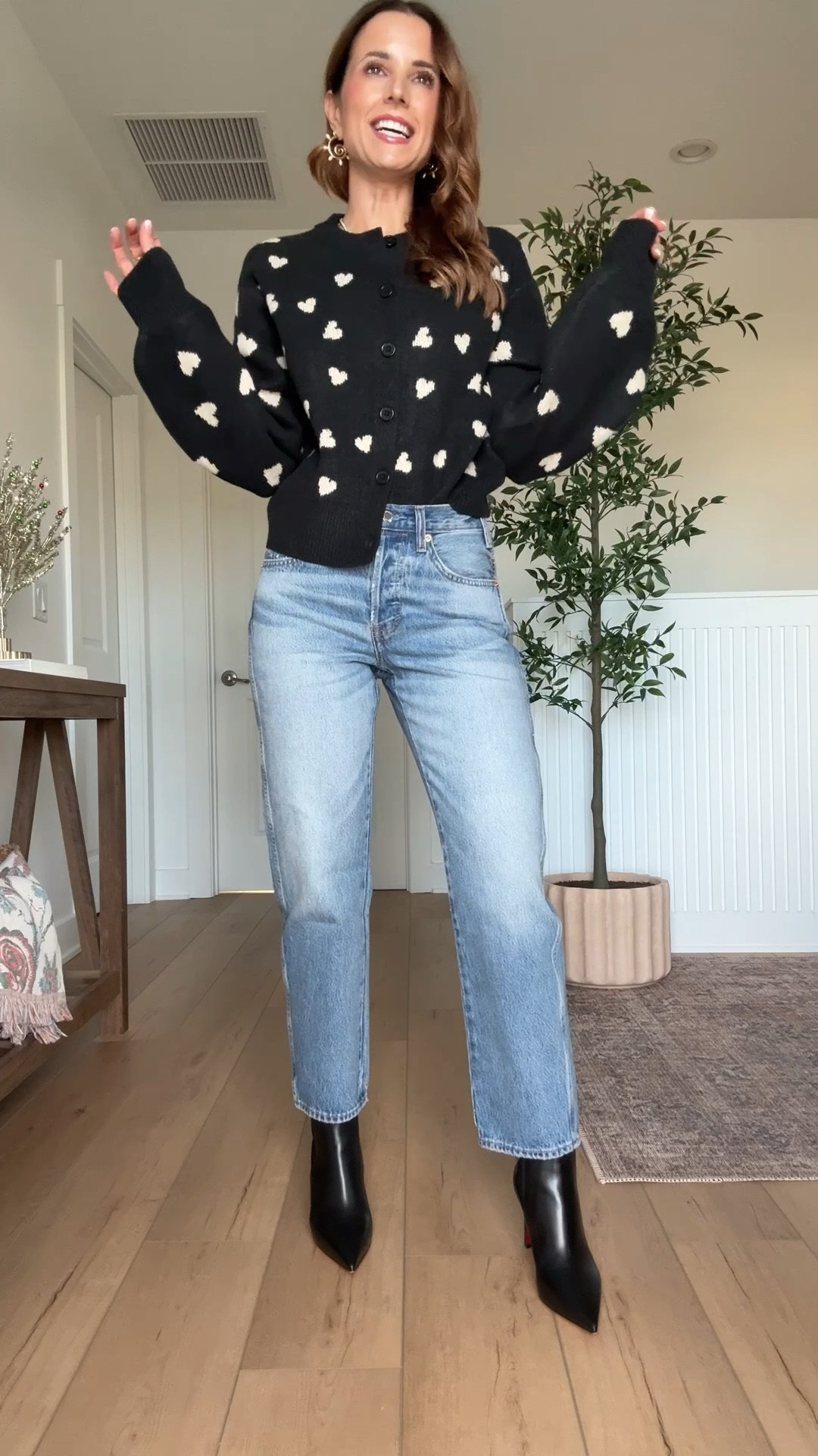 New Target mid-rise boyfriend jeans in 00. Target heart sweater. Casual outfit. Winter outfit. Spring outfit. Valentine’s Day sweater. Christian Louboutin Condodo boots - I went up half a size. 

#LTKootd #LTKmomlife #LTKgrwm