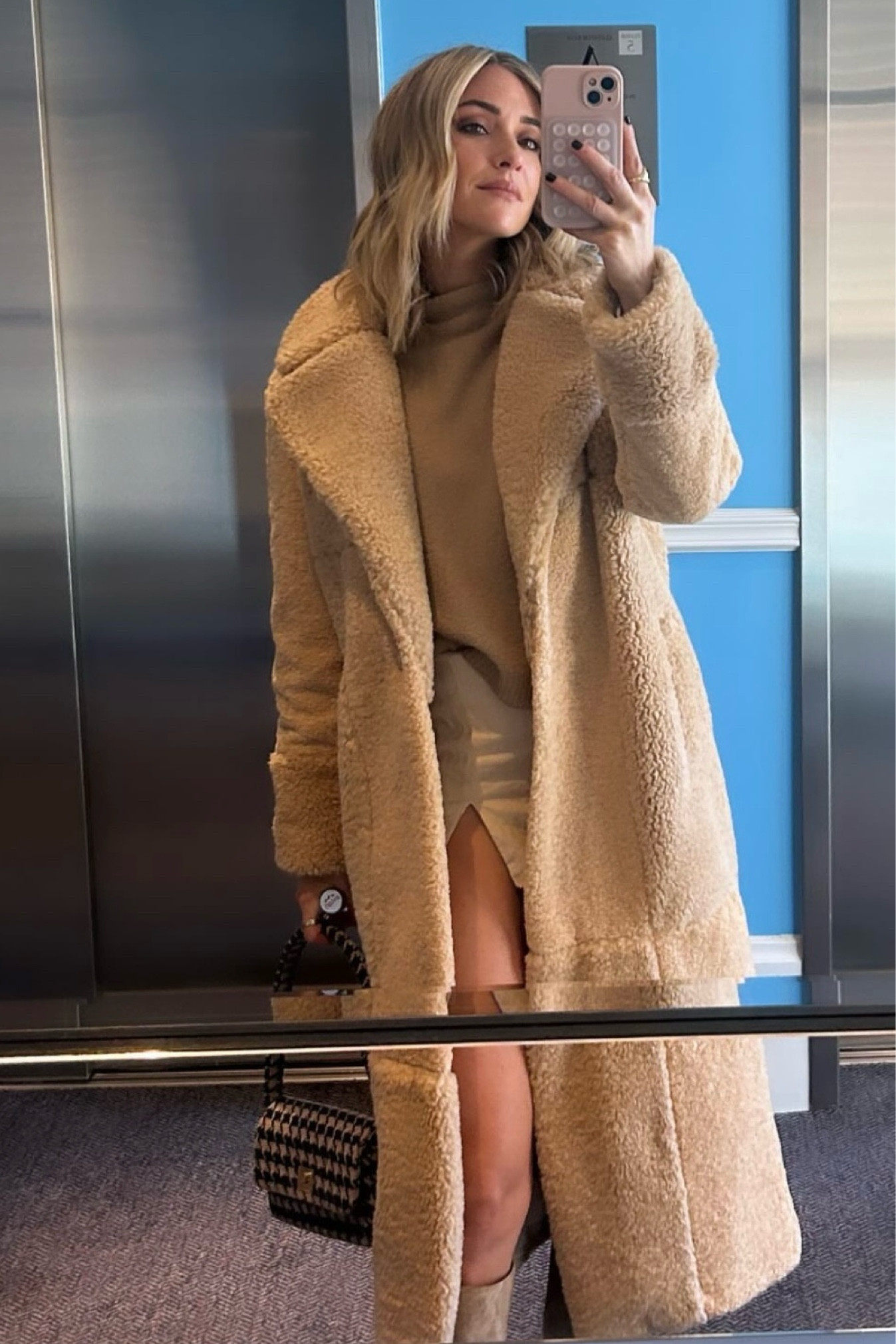 Shop Kristin Cavallari's neutral faux fur coat, neutral colored slit mini skirts and gold jewelry

#LTKHoliday #LTKstyletip #LTKfindsunder100