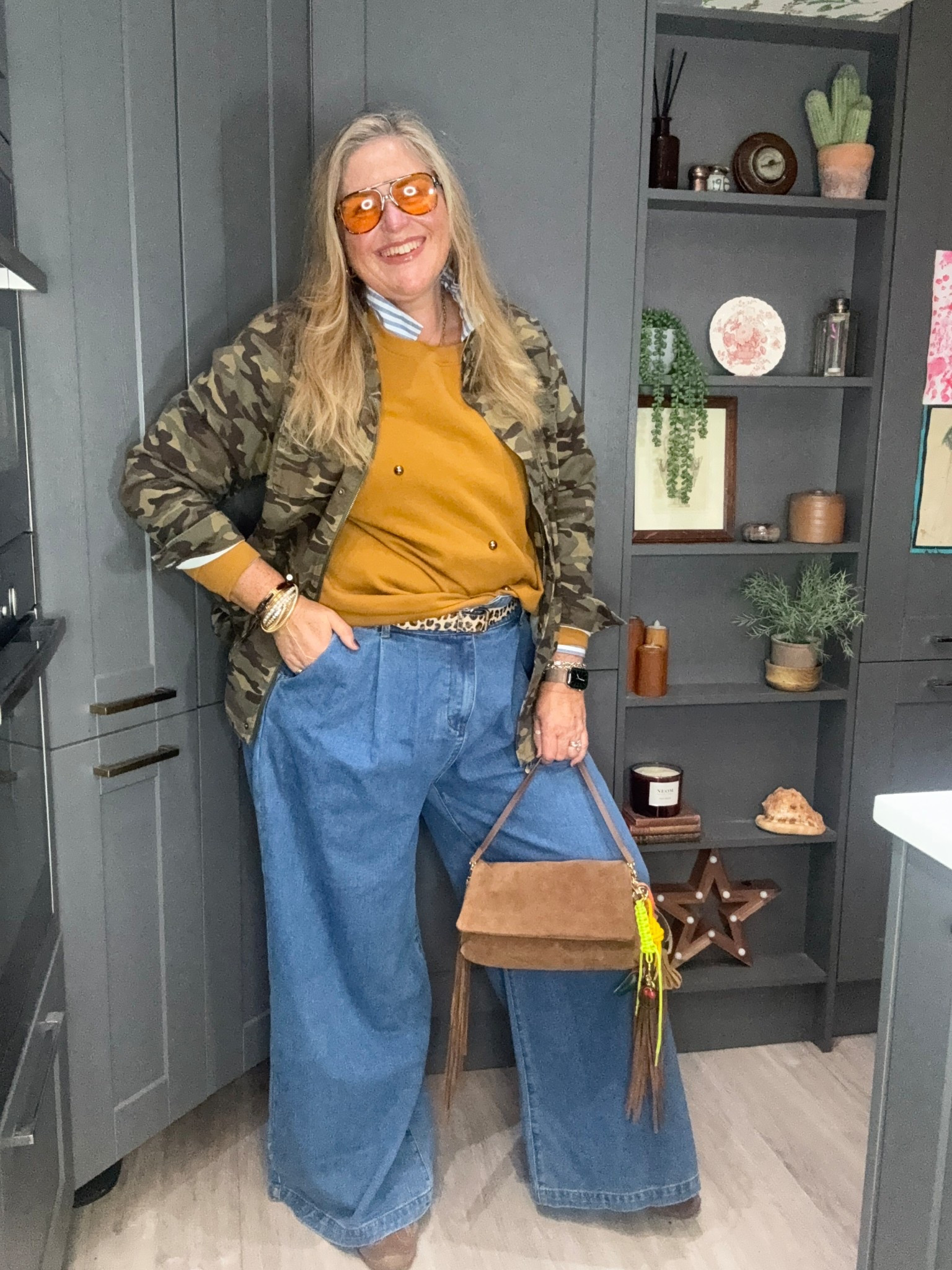 Wide leg jeans, studded sweatshirt, camo jacket, striped shirt, suede bag, suede trainers, sunglasses 

#LTKplussize #LTKautumn #LTKjeans