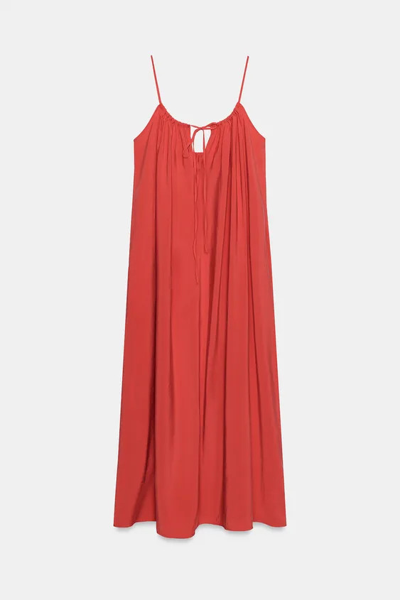 Midi dress made of flowy fabric. V-neck and adjustable spaghetti straps. Ruching and tie detail a... | Zara US