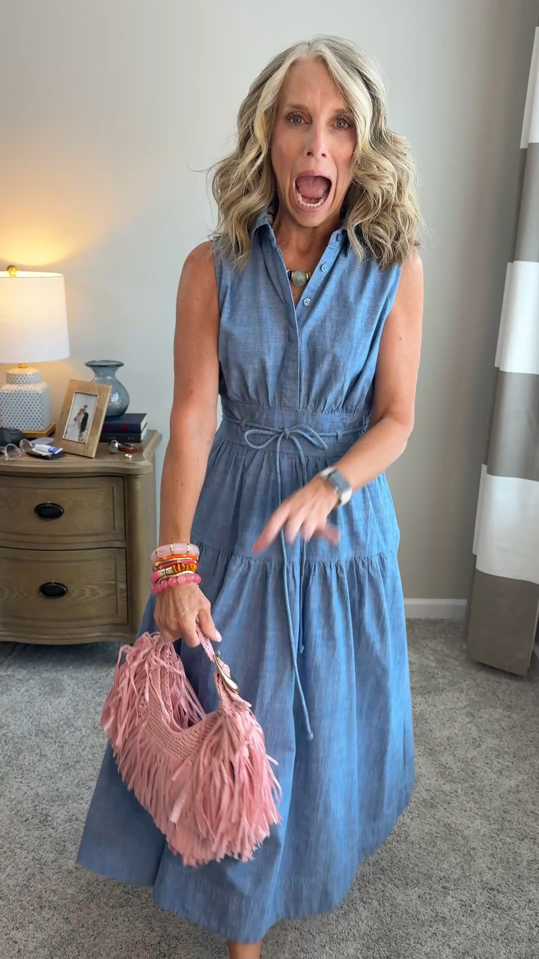 Oh my gosh! SO CUTE. Wearing XS in the most perfect chambray dress.  Perfect for work, church, vacation, travel

#LTKgrwm #LTKootd #LTKOver40