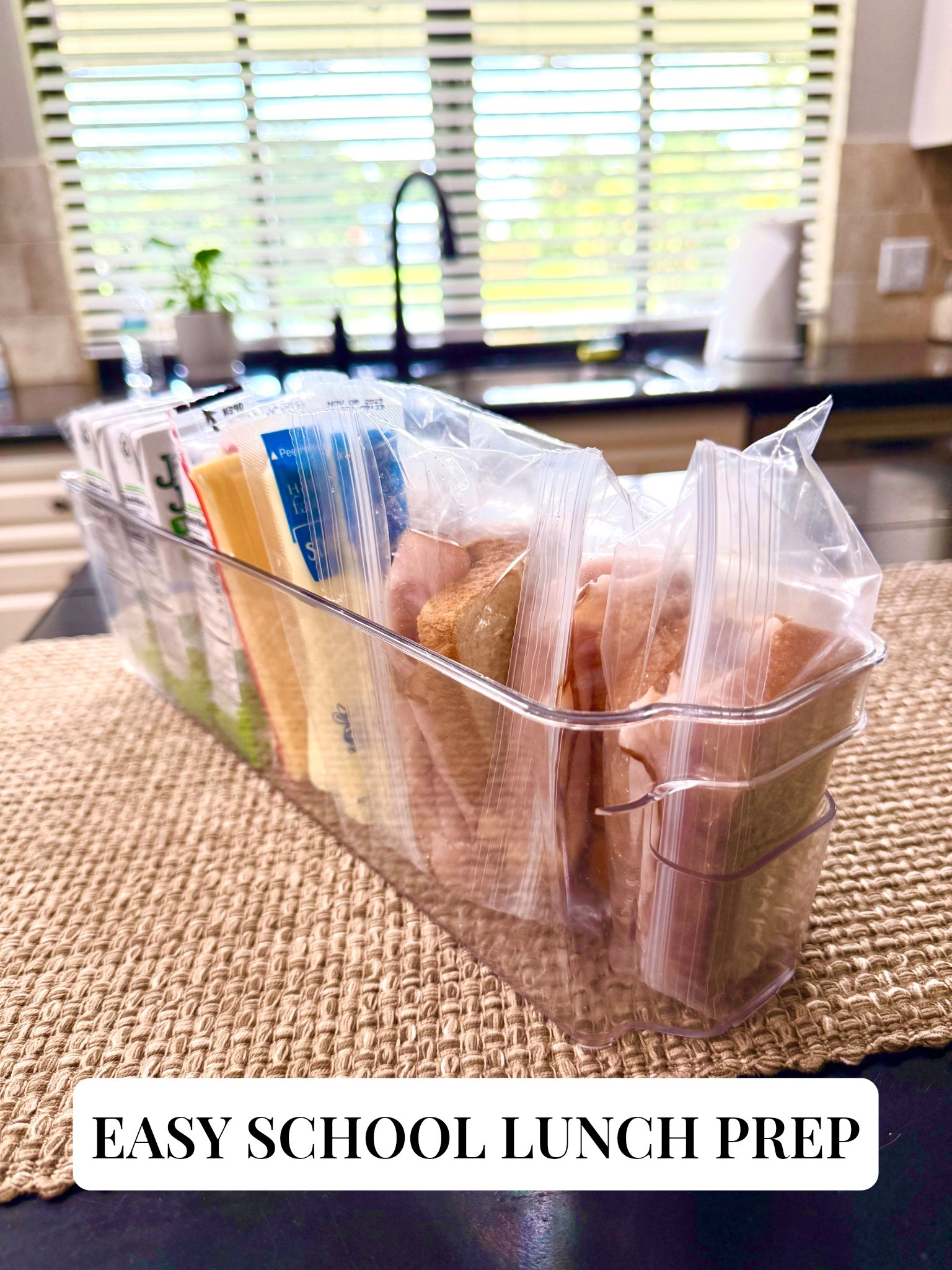 When it comes to my 5th grader, lunch prep is easy! Every Sunday I fill this container with juice, a snack and a sandwich. I make enough for each school day that week. In the morning, he grabs his lunchbox and packs his own lunch. 

School lunch, clear bins, clear bin organization, kitchen hacks, mom hacks, organization 

#LTKKids #LTKFindsUnder50 #LTKHome
