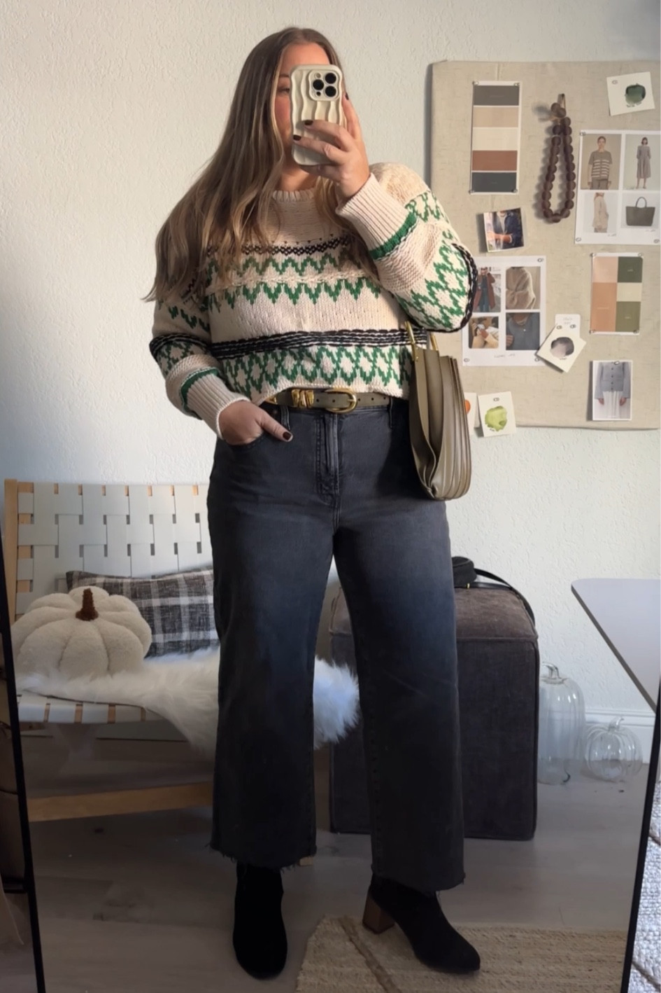 My jeans: madewell perfect vintage wide leg ( i am 5’3 got the regular length and cut mine to my perfect cropped length) - im linking the 2024 washed black version + others . I sized down one ( they do stretch) and would suggest regular length in this crop version if you are under 5’4 and want a regular jean length ( read measurements of inseam if you don’t want to cut and want to buy and wear as is) 

Fair isle sweater : im in medium. Runs fitted/ slim 

boots are old but taller boots work great with wide legs! 

Bag has been restocked!!! 