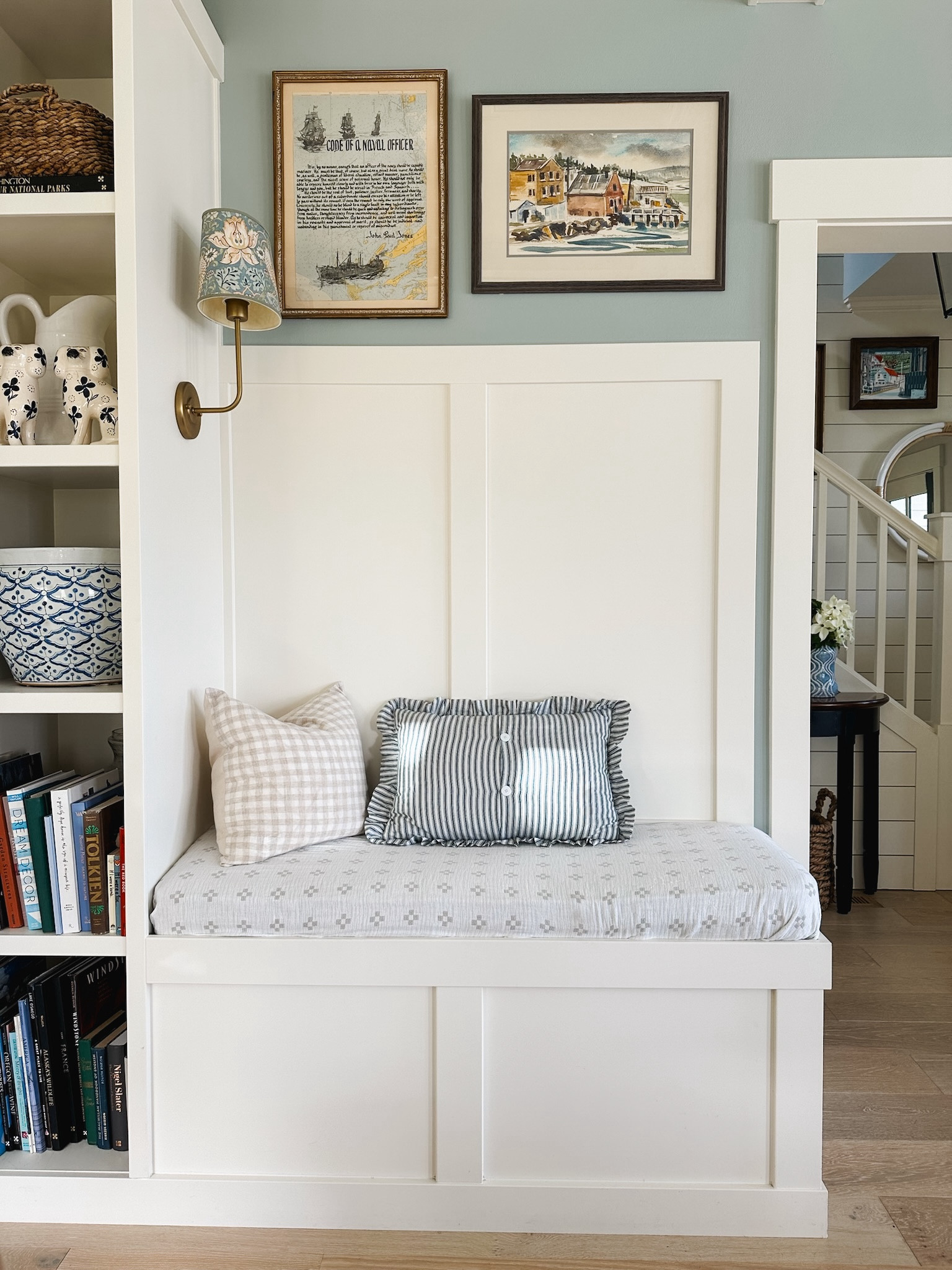 Built in bench with reversible throw blanket, brass wall sconce, patterned shade, ruffle pillow, gingham pillow 

#LTKSeasonal #LTKSaleAlert #LTKHome