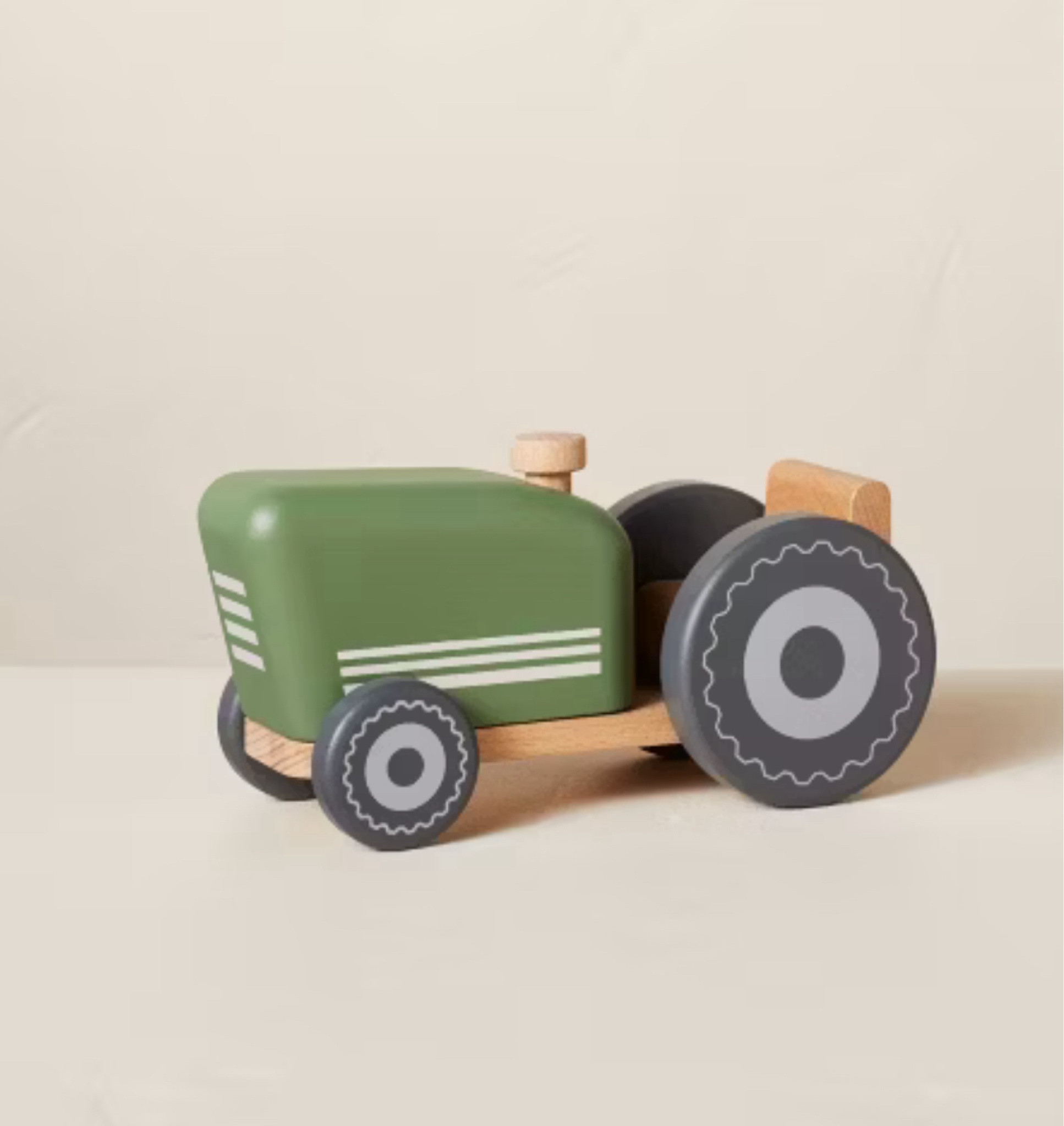 T he Toy Farm Tractor from Hearth & Hand™ with Magnolia makes a great addition to your kid's playtime. This toy features a farm tractor in green and black color to inspire hours of imaginative play. As cute as they are fun to play with, this toy farm tractor also make a great home decor piece.

#LTKKids #LTKFamily #LTKBaby