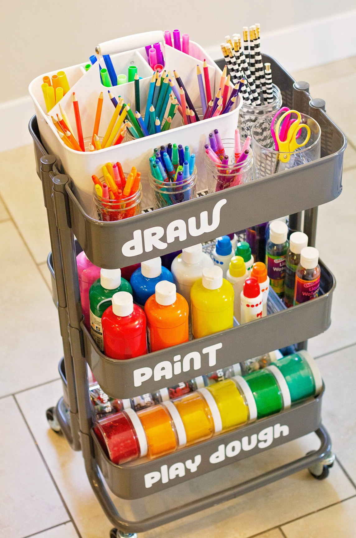Creating a kid's art cart is a perfect way to keep things accessible but still allow them to take things where they need.  Perfect for summer!

#kidscraft #kidsartsupplies #playroomorganization 

 #LTKHome #LTKKids #LTKFamily