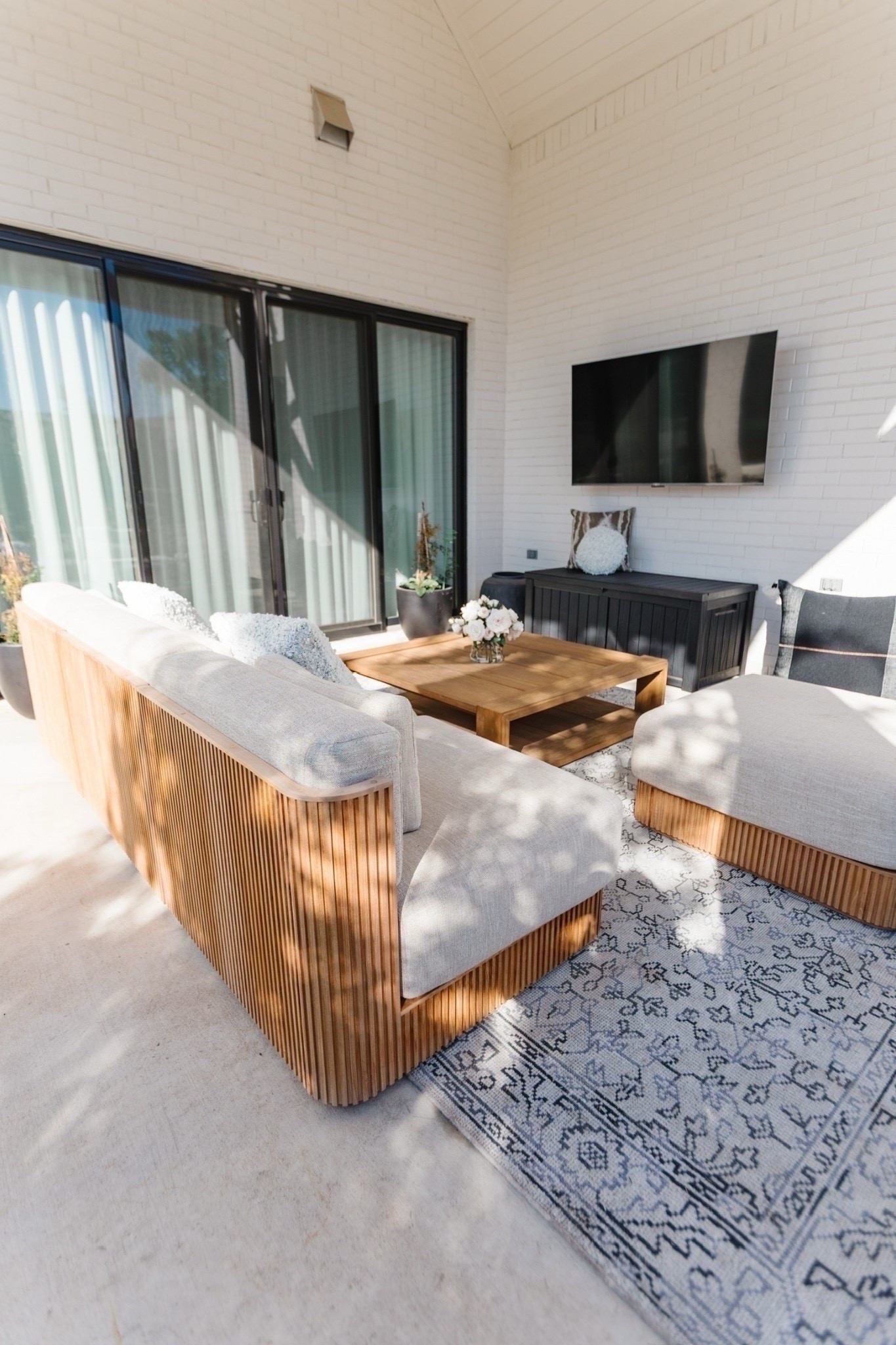 Outdoor patio with teakwood sofa set, teak coffee table, and more. Love how durable the furniture is and how pretty it looks! Perfect for any home and so comfy 

#LTKHome