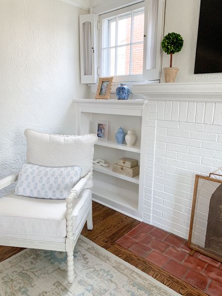 Shelf decor, bookshelf styling, spindle chair, affordable home decor 

#LTKhome #LTKfindsunder100