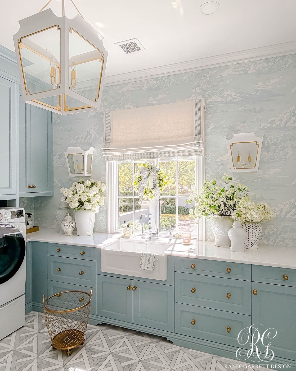 Spring touches in our laundry room. These faux florals and spring wreath and wreath bow can be used anywhere in your home!

#LTKHome #LTKdayinmylife #LTKSeasonal