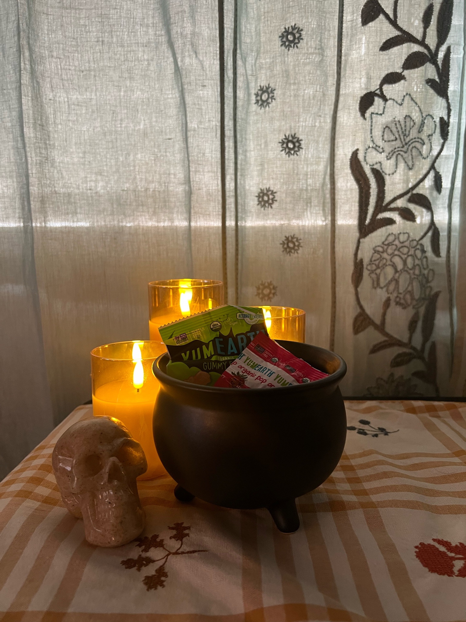 Cute Halloween decor on my living room console table. Resin skull decoration from Tjmaxx and a stone cauldron from Target

#LTKhome #LTKSeasonal
