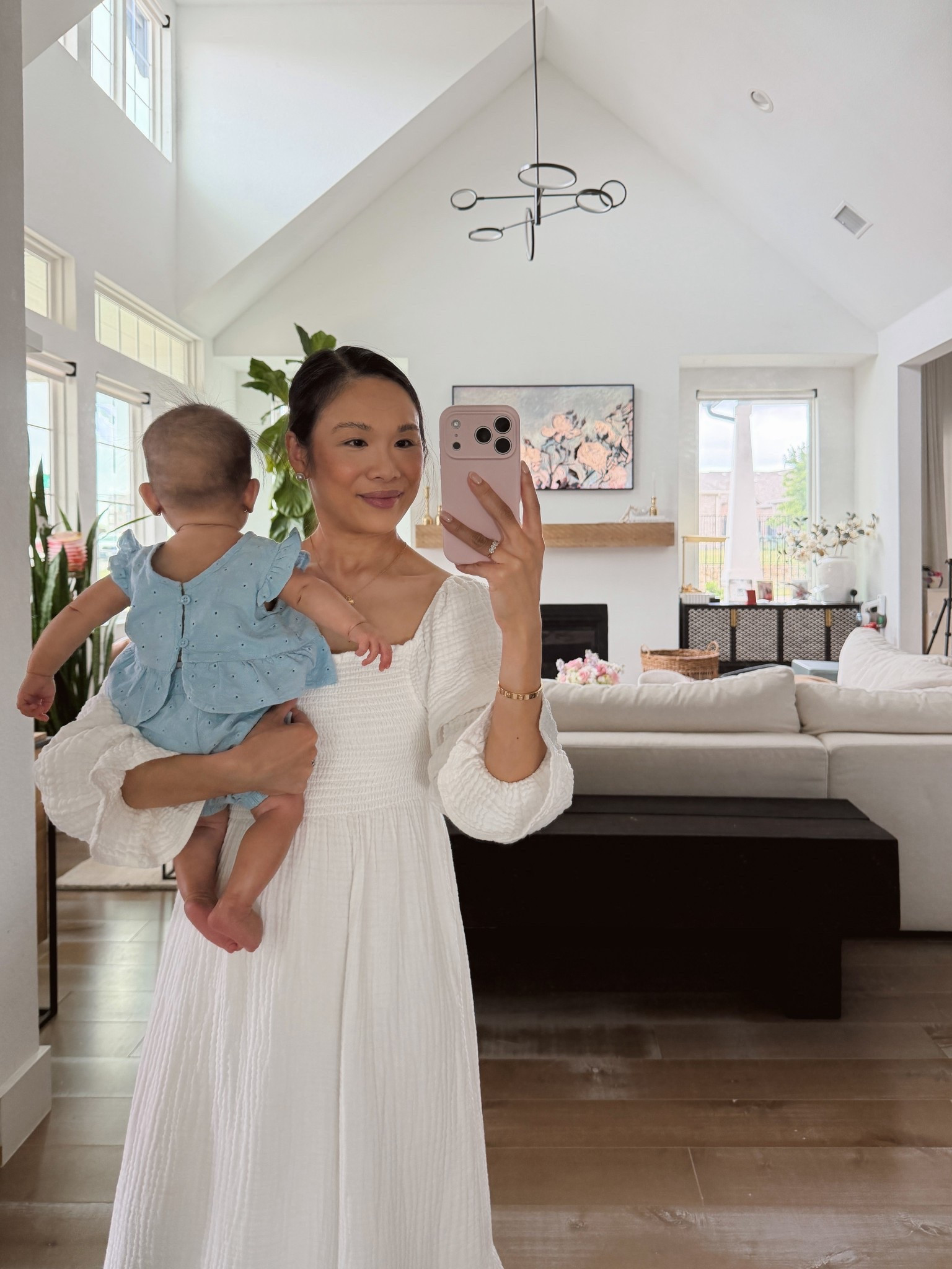 New Mom outfit of the day with a nursing friendly stretchy cotton muslin dress. Love how this is so comfortable and I wore it throughout pregnancy, too! Baby girl is wearing an organic cotton eyelet set that’s perfect for spring and summer. 

#LTKmomlife #LTKBaby