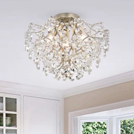 Shop crystal chandeliers! The Myria LED Semi Flush Mount is under $200.

Keywords: Crystal chandelier, dining room, living room

#LTKSeasonal #LTKSaleAlert #LTKParties