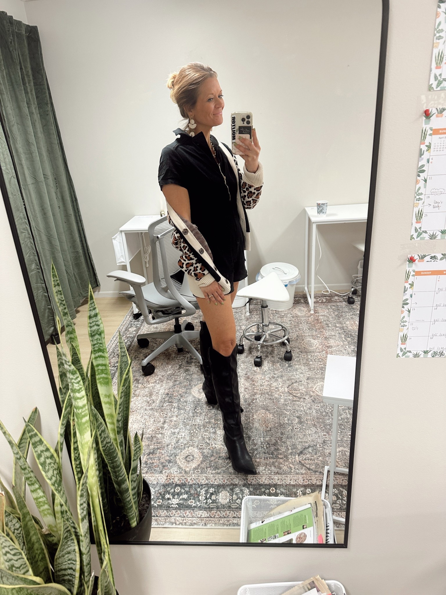 Black Jean romper with my fave tall black boots. Going on season 3 of these staples. Paired with a leopard cardi - linked similar styles we approve of. 