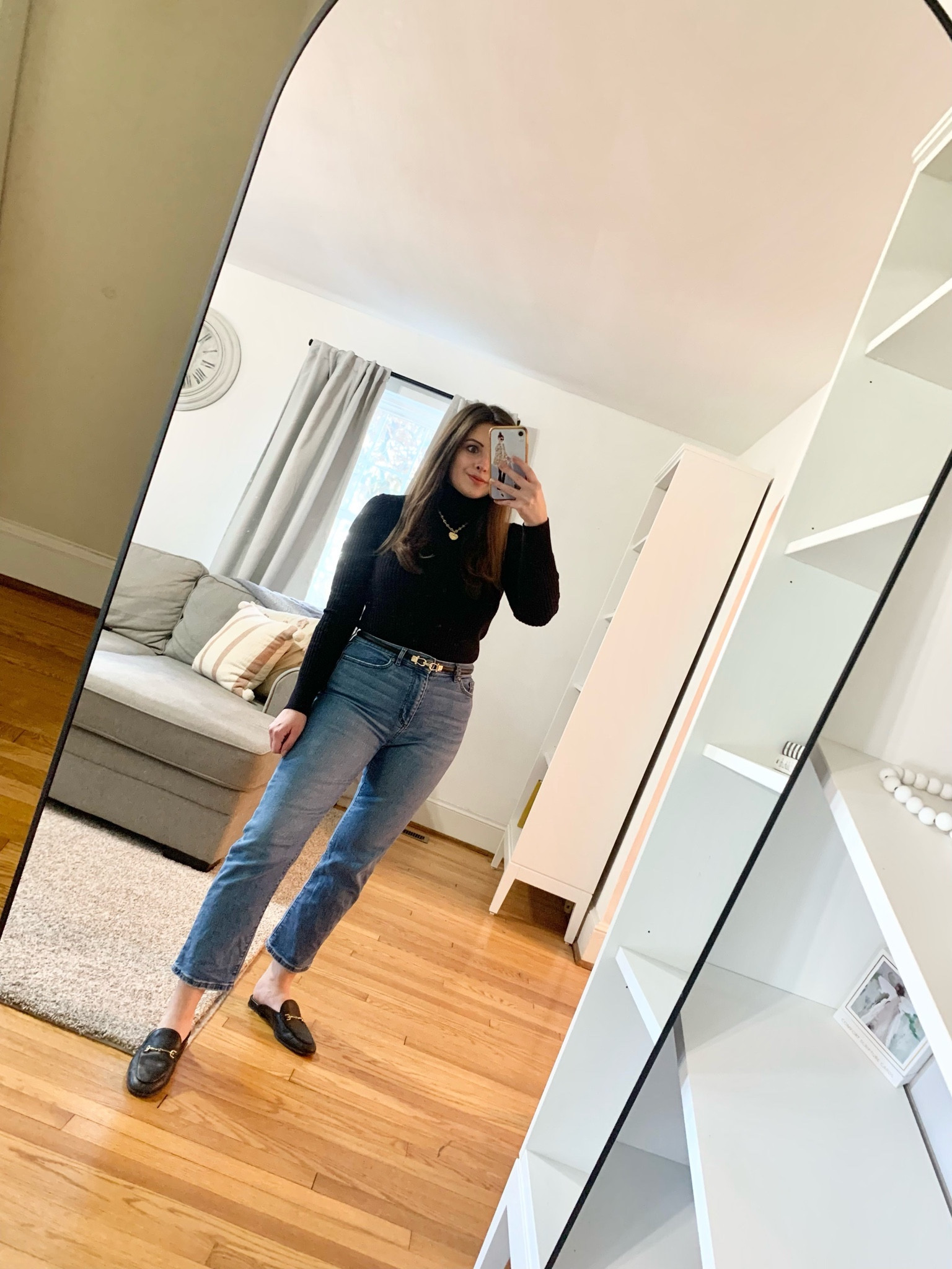 Casual winter outfit 🤎 My favorite turtleneck is on sale for only $13! Size up one. I normally wear a SP and sized up to a MP. Love the heart pendant necklace for Valentine’s Day.

black turtle neck, black mules, skinny belt, petite jeans, ankle cut jeans, casual work outfit 

#LTKover40 #LTKworkwear #LTKMostLoved