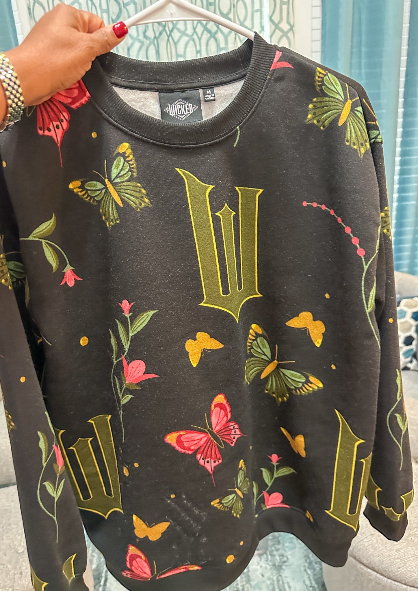 Our teenager went to the movies with her friends. She wanted a “Wicked” sweatshirt. Picked up this Wicked  Graphic Print Fleece Sweatshirt. Really cute. #wicked #wickedmovies #movies #Wickedforgood