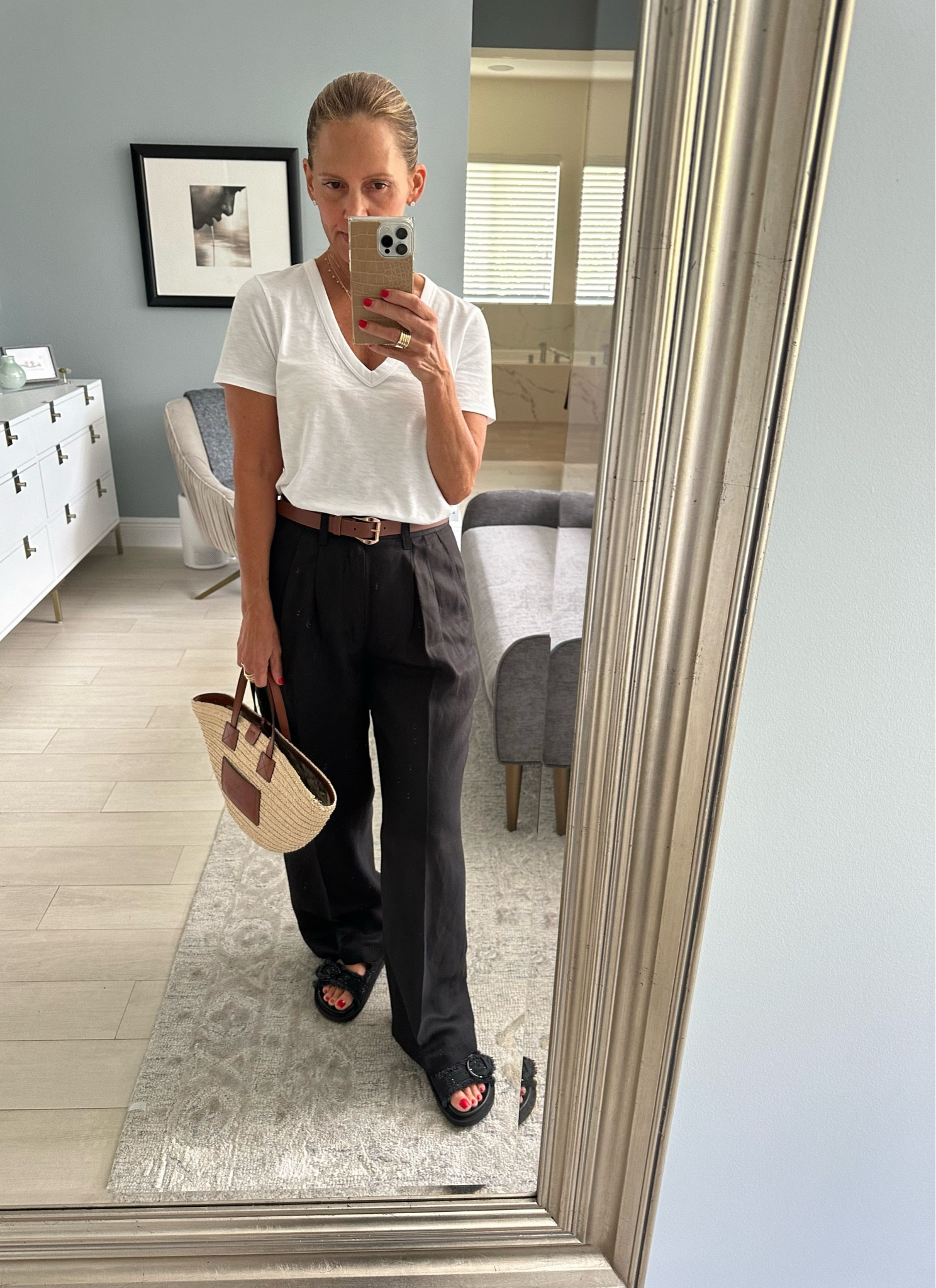 Two wardrobe essentials: great white tee and great black pant.
 
The pant is a silk/linen blend so it’s perfect for the Spring /Summer and even early Fall. In Miami it’s all year round! 
 
Stylist Tip: using the “Sandwich Method” of matching 2 accessories, here the bag and belt, I have added more dimension and interest to an otherwise very simple black and white outfit!

#LTKSeasonal #LTKover40 #LTKU