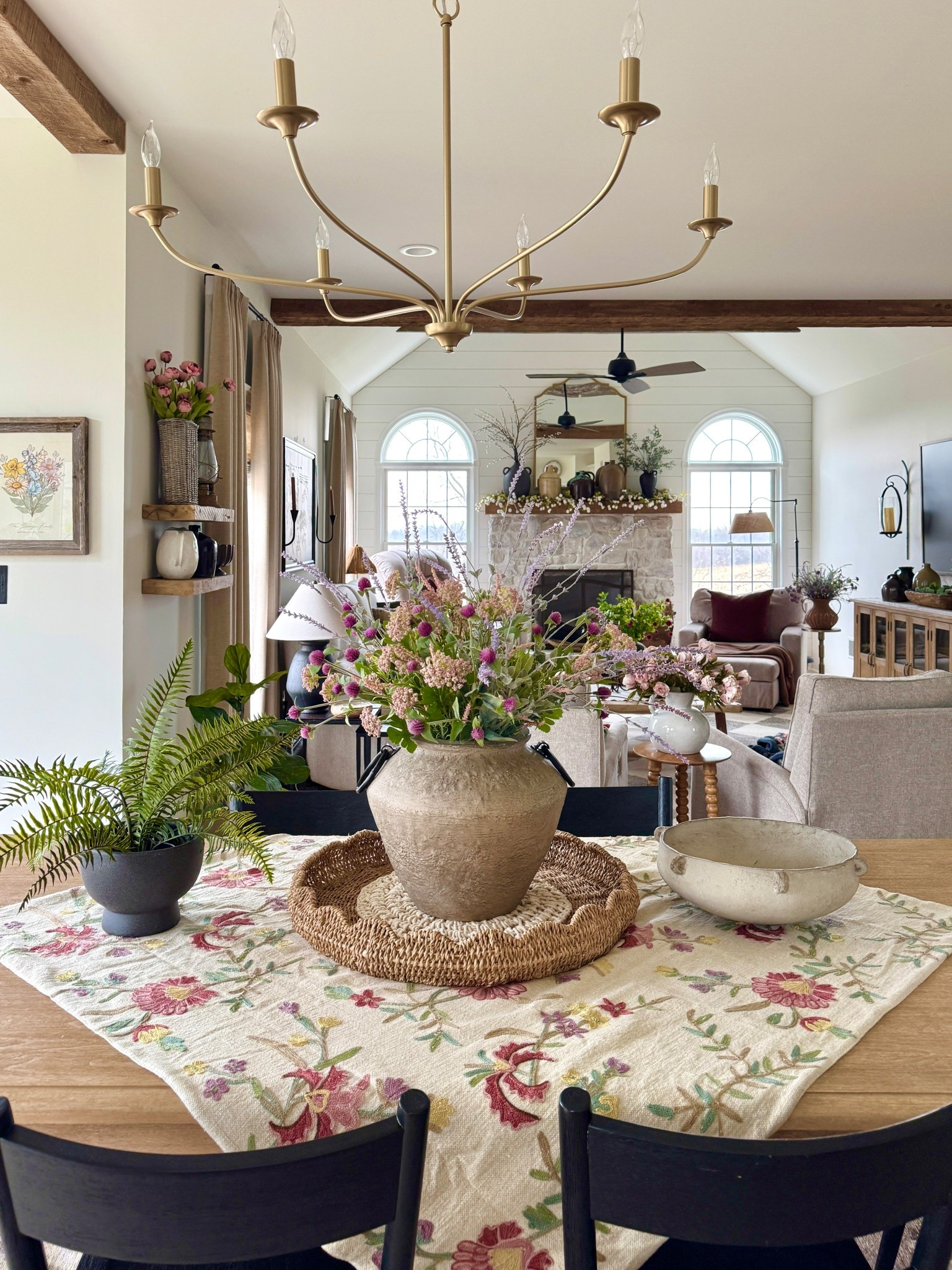 Colorful floral table throw, faux florals and greenery, artisan bowl, brushed brass chandelier, organic cream vases, accent table, dining table, wall mirror, curved floor lamp, reclaimed wood shelves and more  

#LTKSeasonal #LTKHome