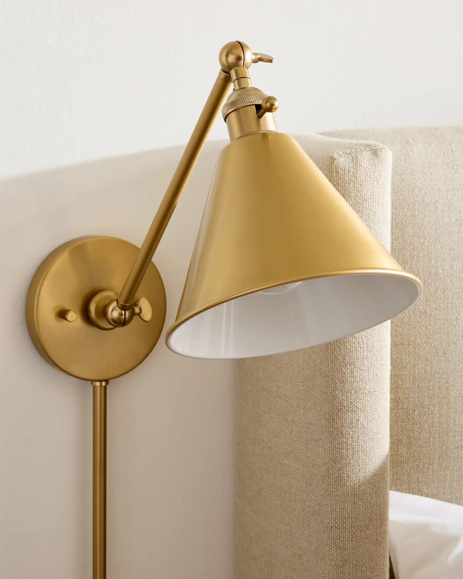 Articulating Single Arm Steel Wall Sconce in Brass | Quince