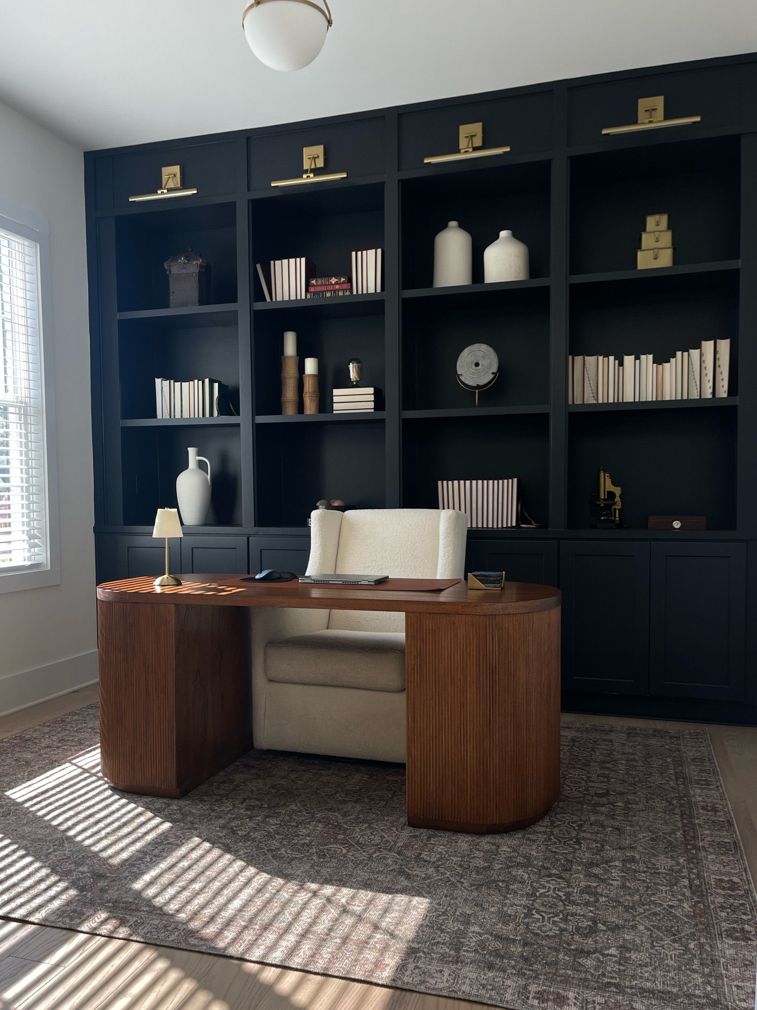 Continuing to add to the office and finally found a rug to pull the room together 

New rug from RugsUSA

Home find home office 

#LTKHome