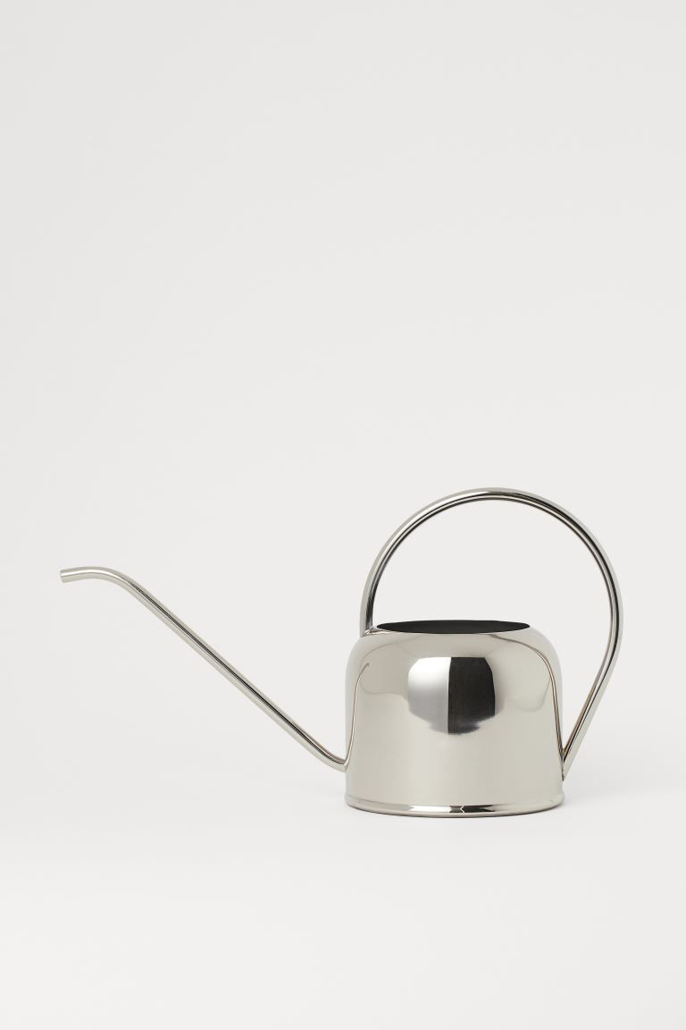 Metal watering can with a rounded handle at top and narrow spout at front. Diameter approx. 6 in.... | H&M (US + CA)