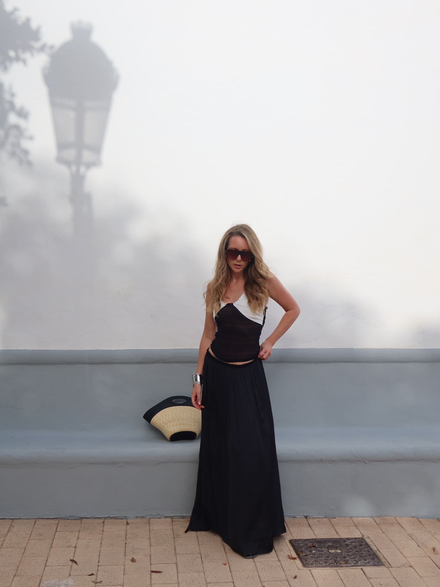 I turned this dress in on itself to measure it a skirt and it totally paid off 

Strappy top, black maxi skirt, silk skirt, straw bag, raffia bag, Musier Paris, summer top, summer skirt, revolve 

#LTKluxury #LTKuk #LTKsummer