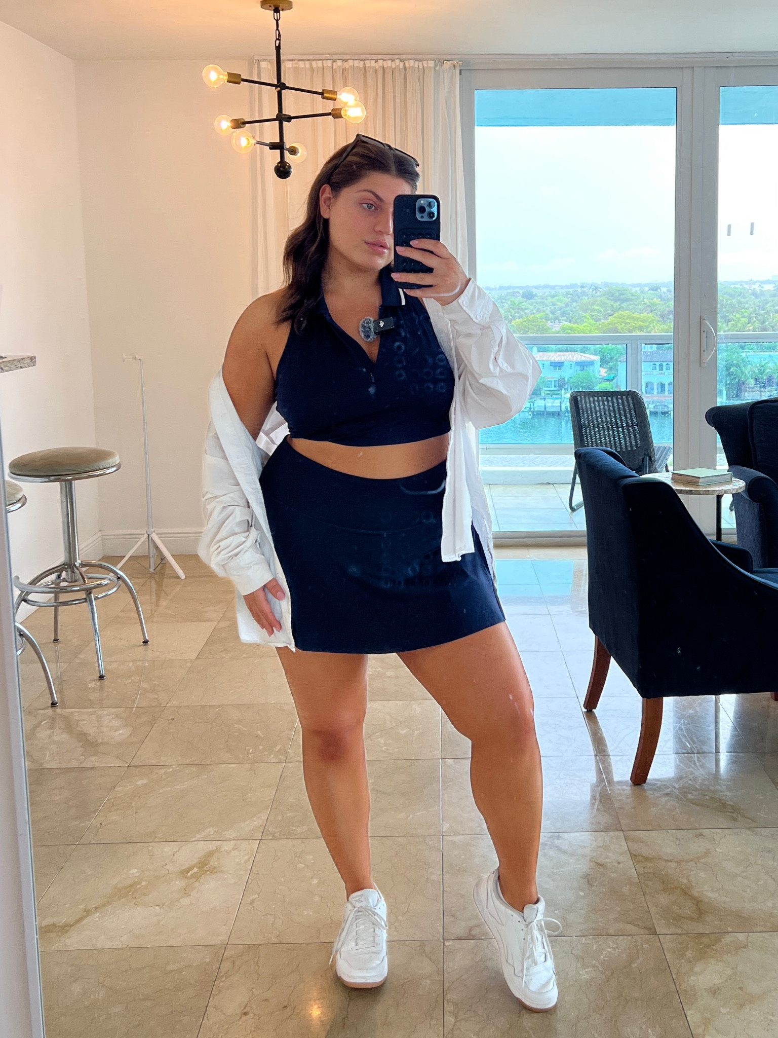 love my new athleta skirt/polo tank set !! fits so good and so cute to wear for tennis, working out, lounging, running errands, etc! 

love a matching set! wearing XL but i would size down in top if you want a more tight fit! it’s also longer in length but i tied the top in the back to make it more cropped! 

#tennis #fitness #sets 

#LTKplussize #LTKfitness